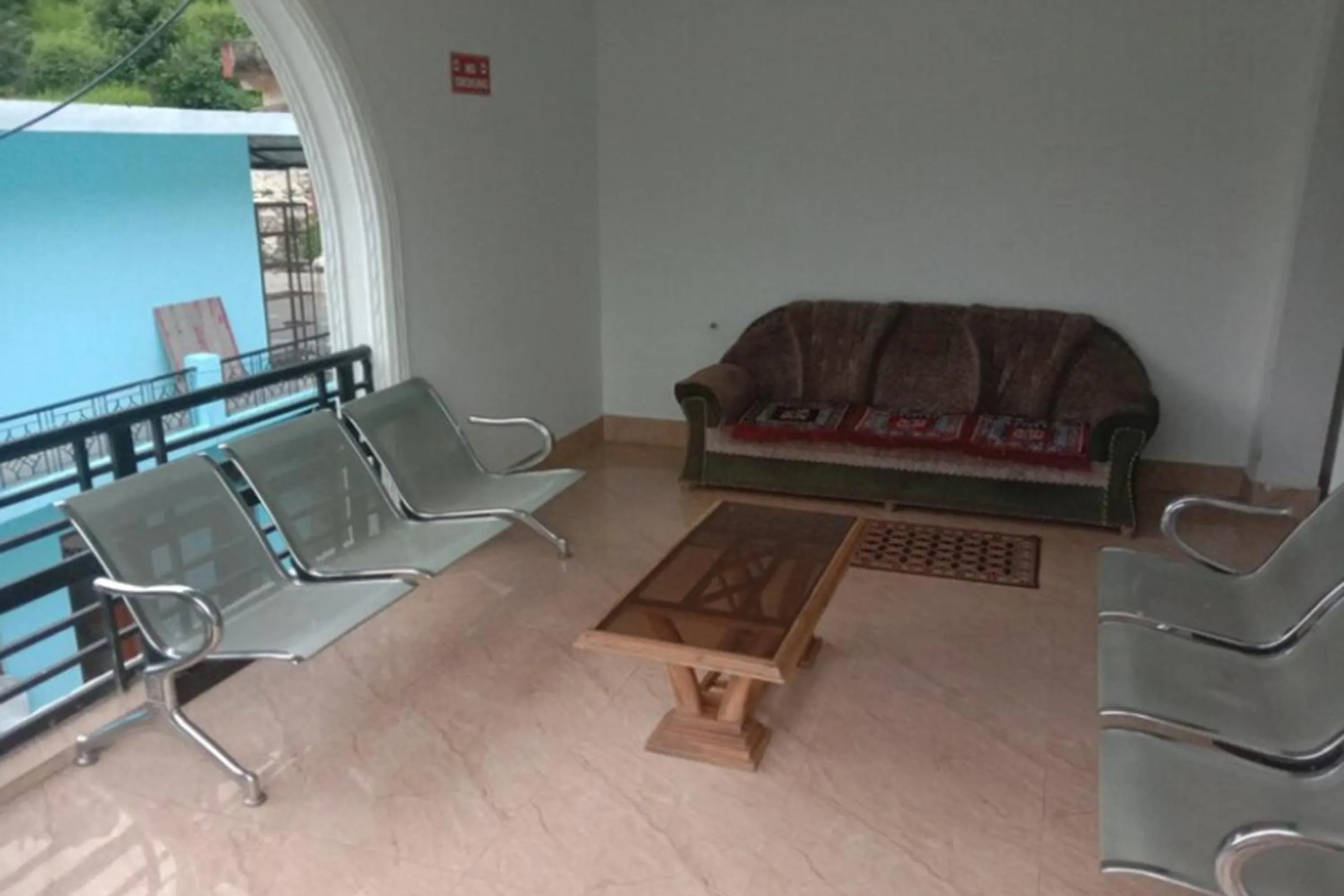 Seating area in HOTEL PUSPWAN AND RESTAURANT by StayApart