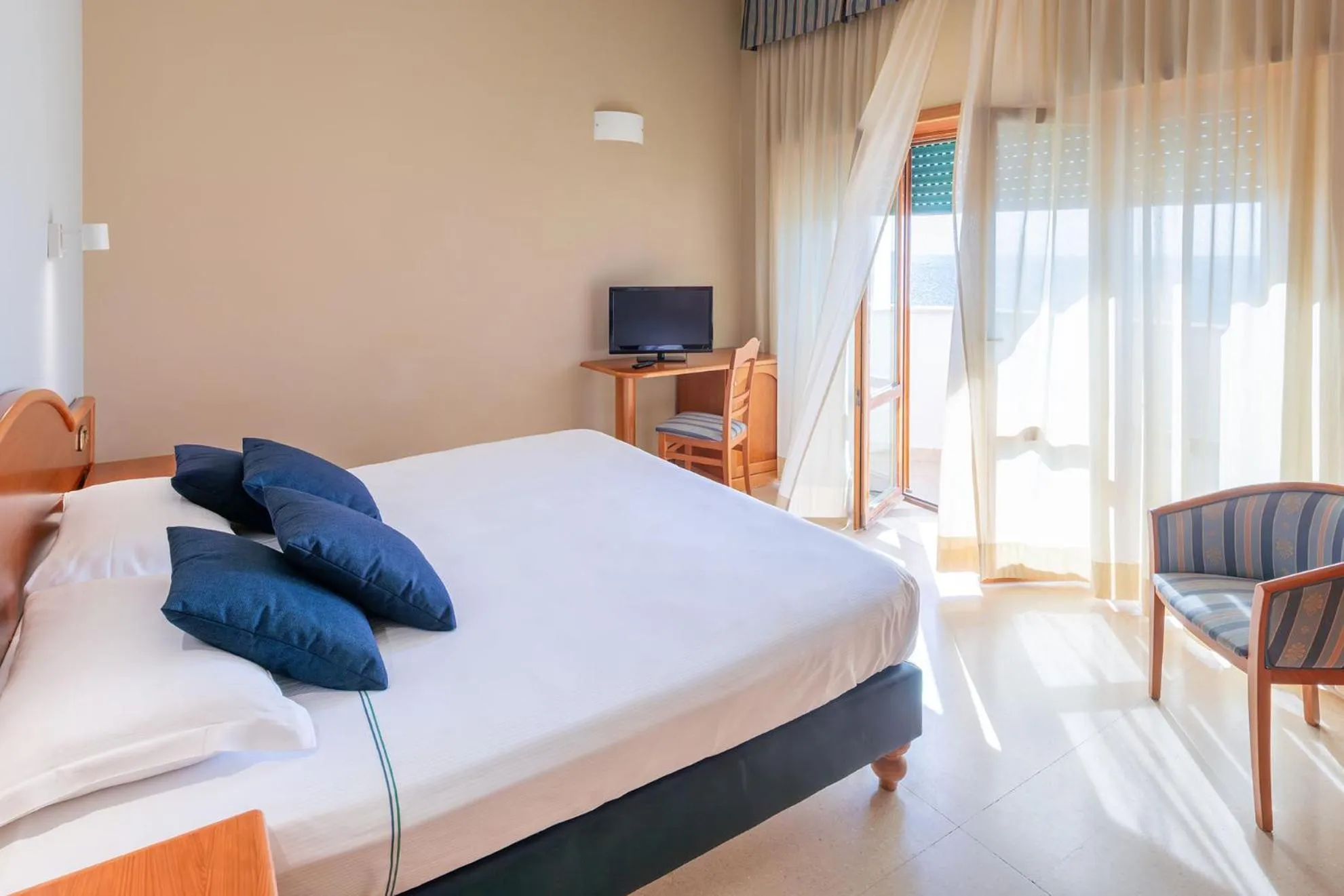 Bed in Astura Palace Hotel