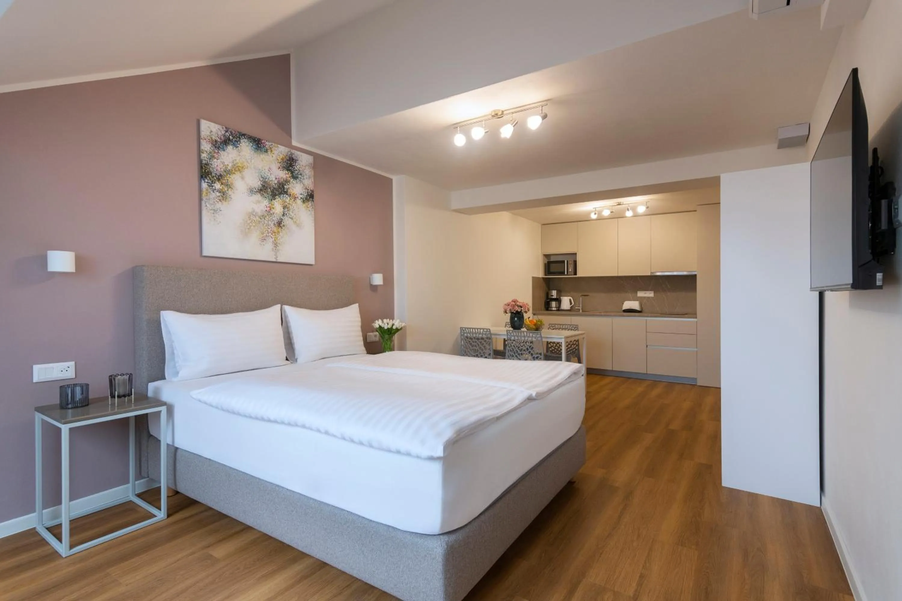 Bed in Hidden Art Boutique Residence by Dwellfort