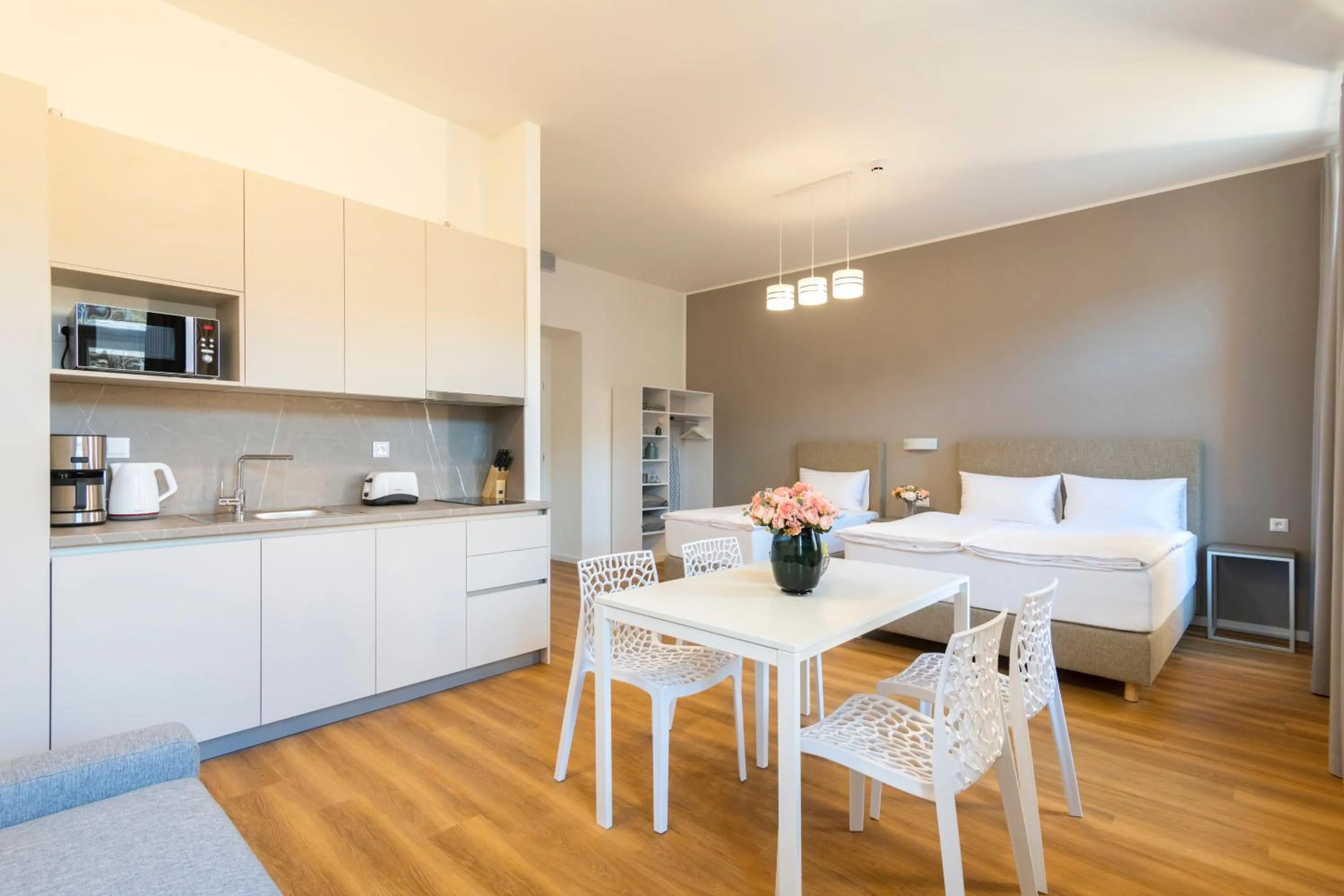 Kitchen or kitchenette in Hidden Art Boutique Residence by Dwellfort