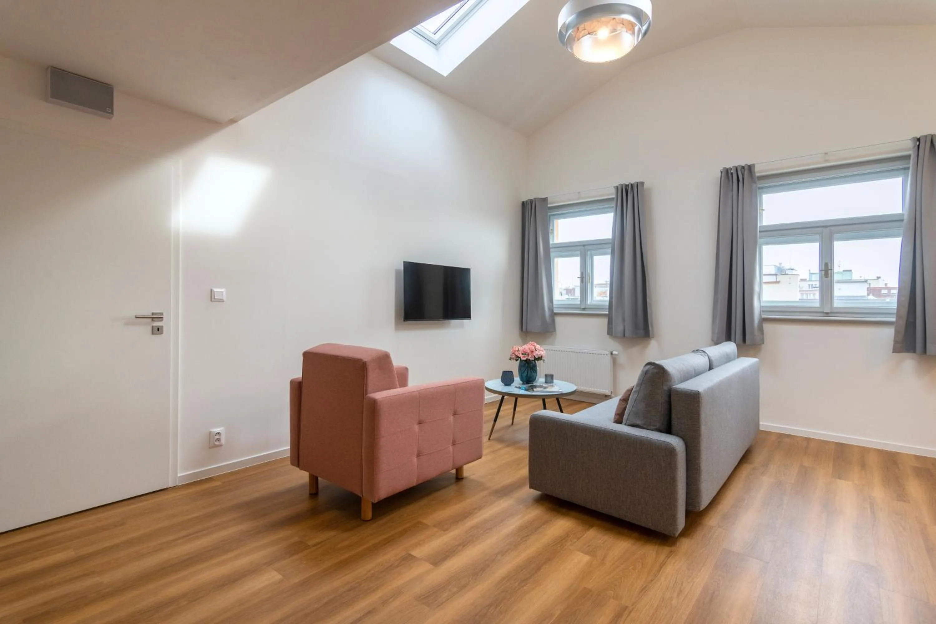 Living room in Hidden Art Boutique Residence by Dwellfort