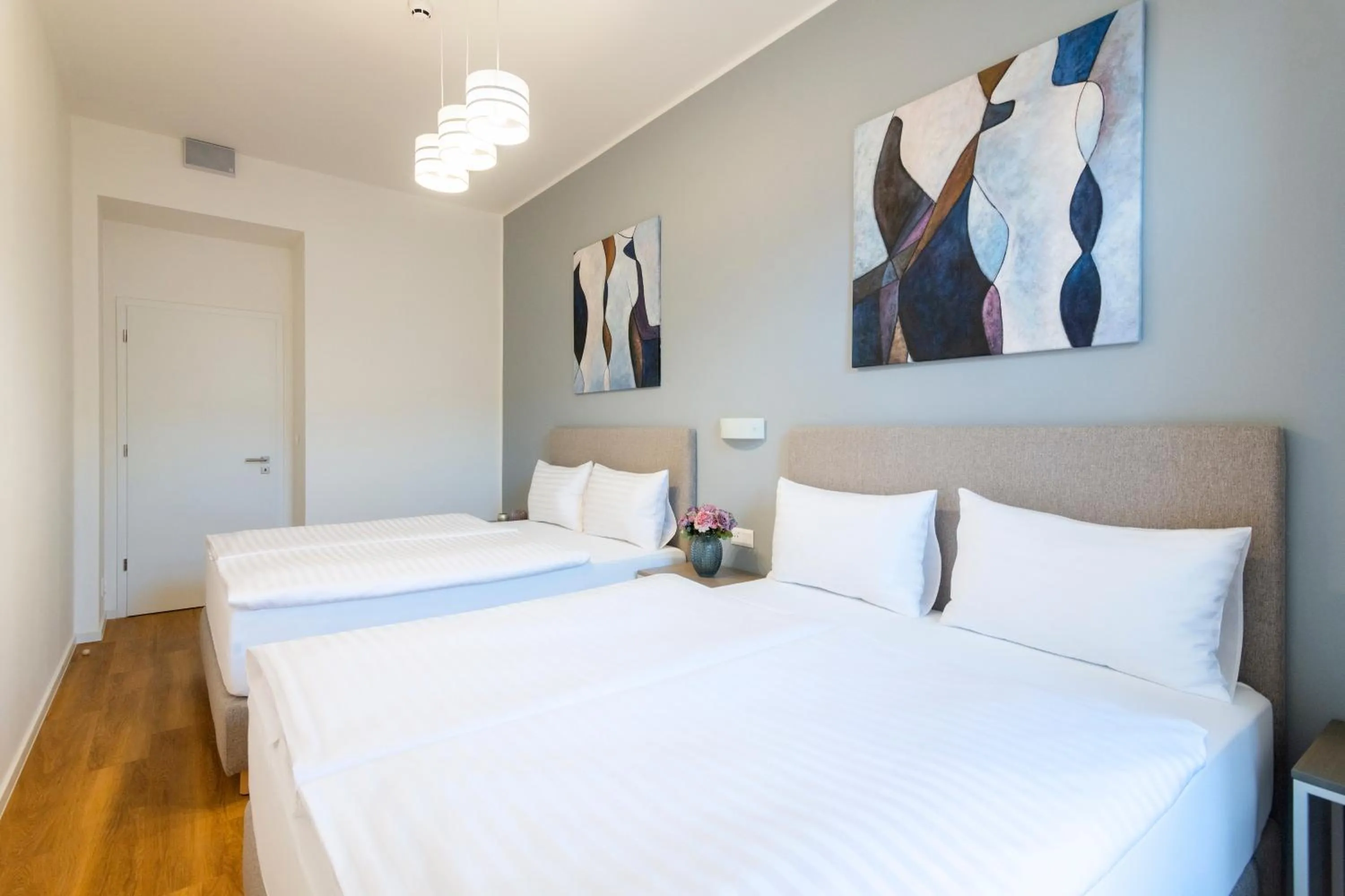 Bed in Hidden Art Boutique Residence by Dwellfort