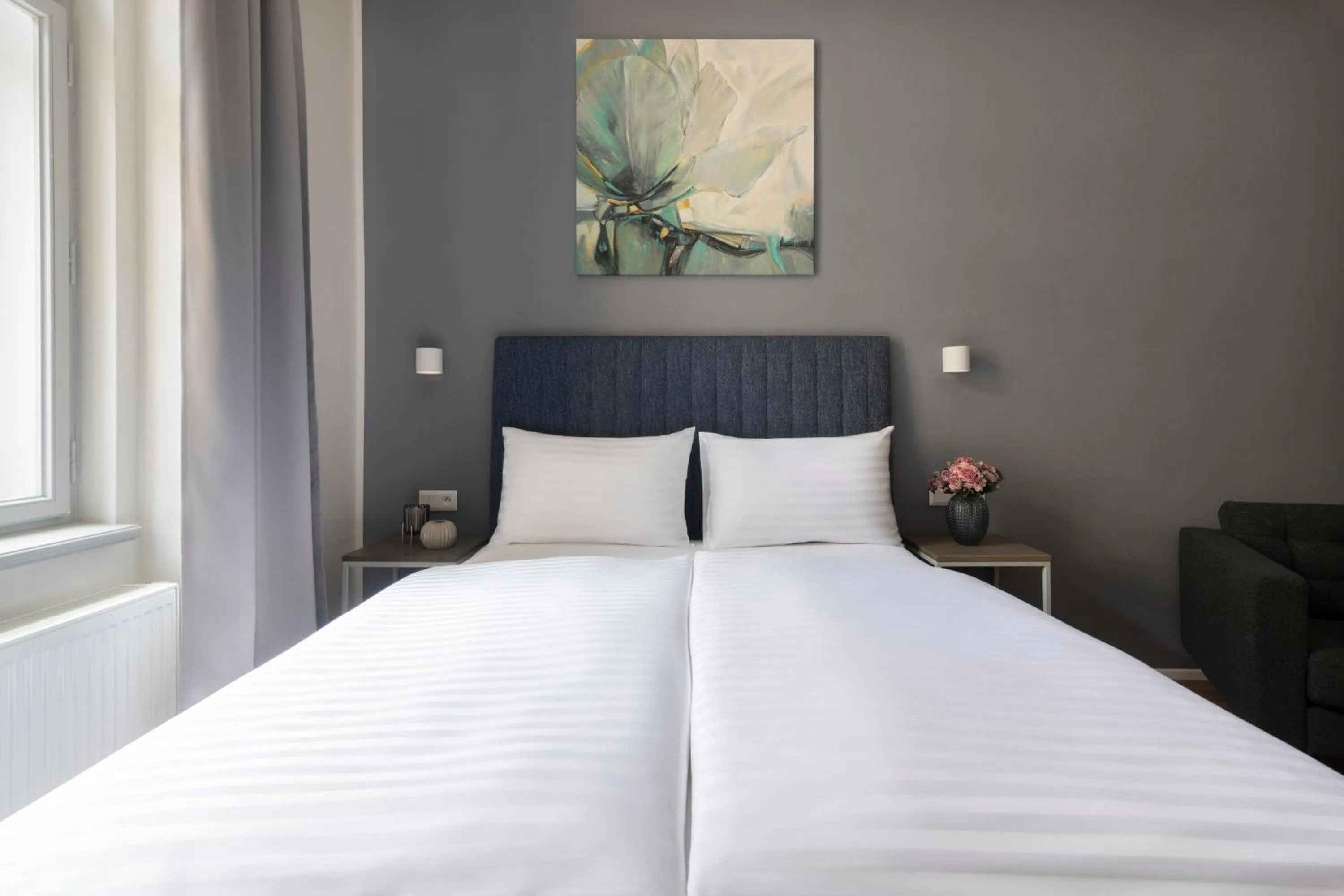 Bed in Hidden Art Boutique Residence by Dwellfort