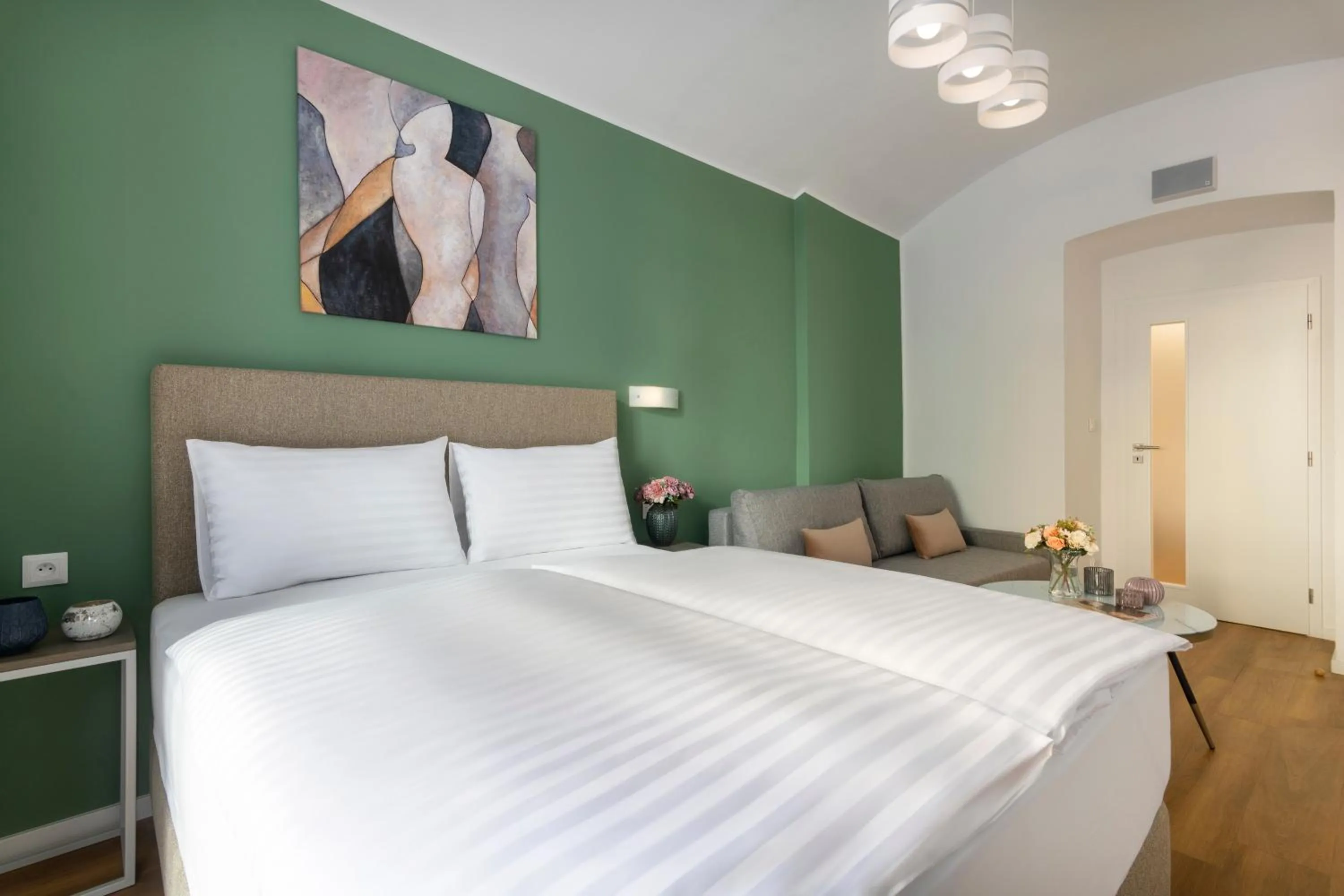 Bed in Hidden Art Boutique Residence by Dwellfort