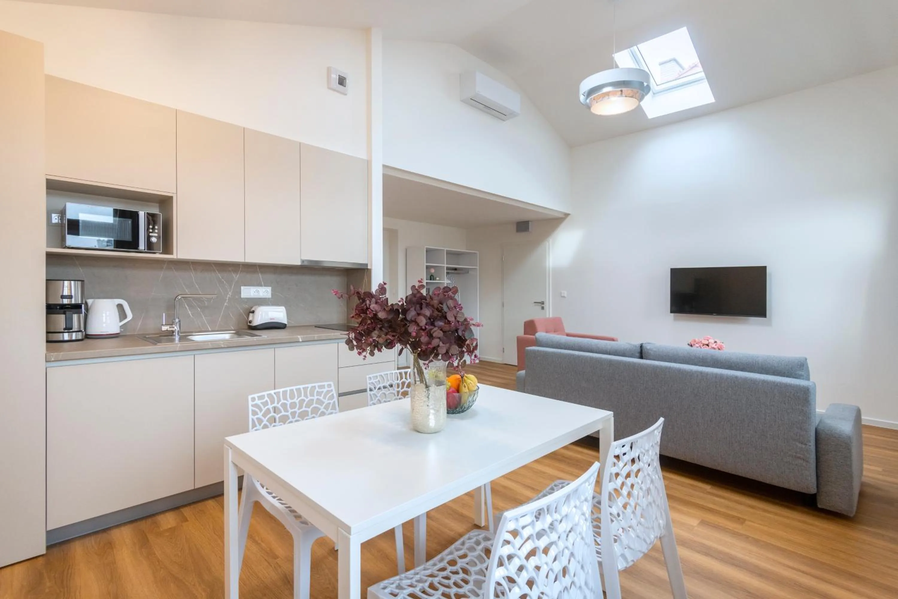 Kitchen or kitchenette in Hidden Art Boutique Residence by Dwellfort