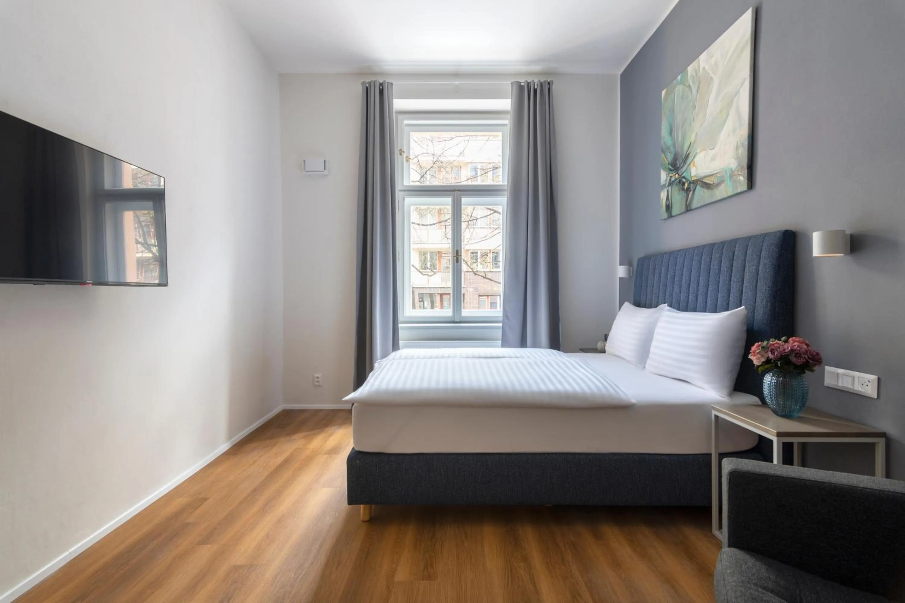 Bedroom, Bed in Hidden Art Boutique Residence by Dwellfort