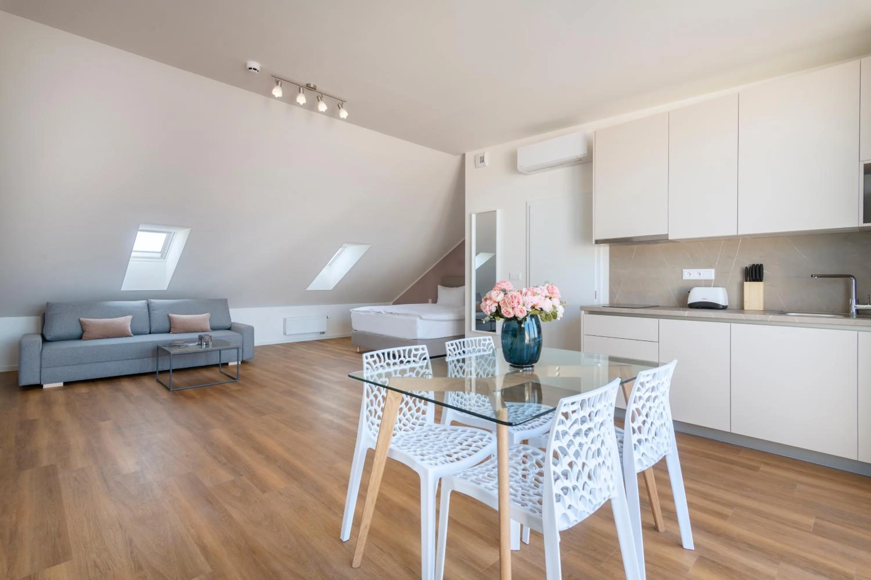 Dining area in Hidden Art Boutique Residence by Dwellfort