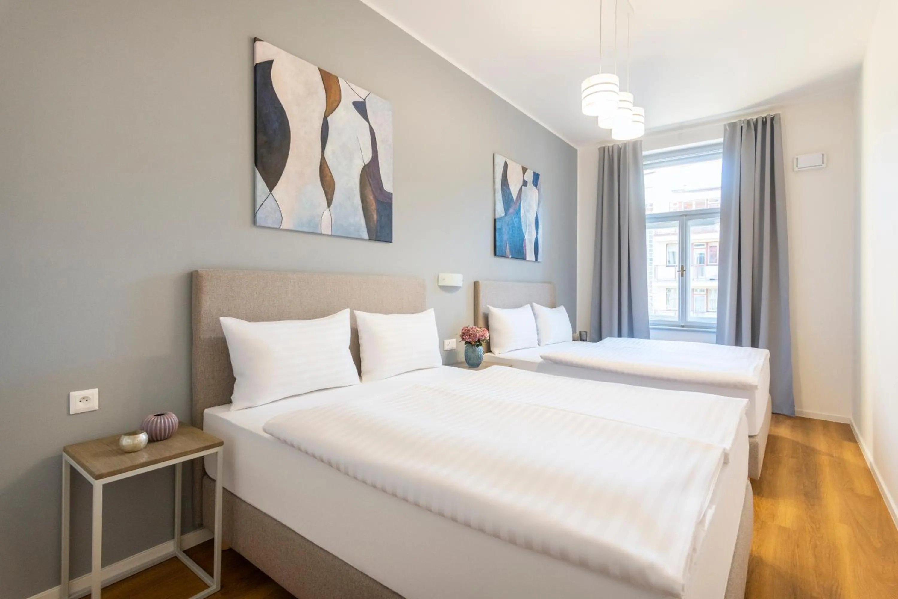 Bed in Hidden Art Boutique Residence by Dwellfort