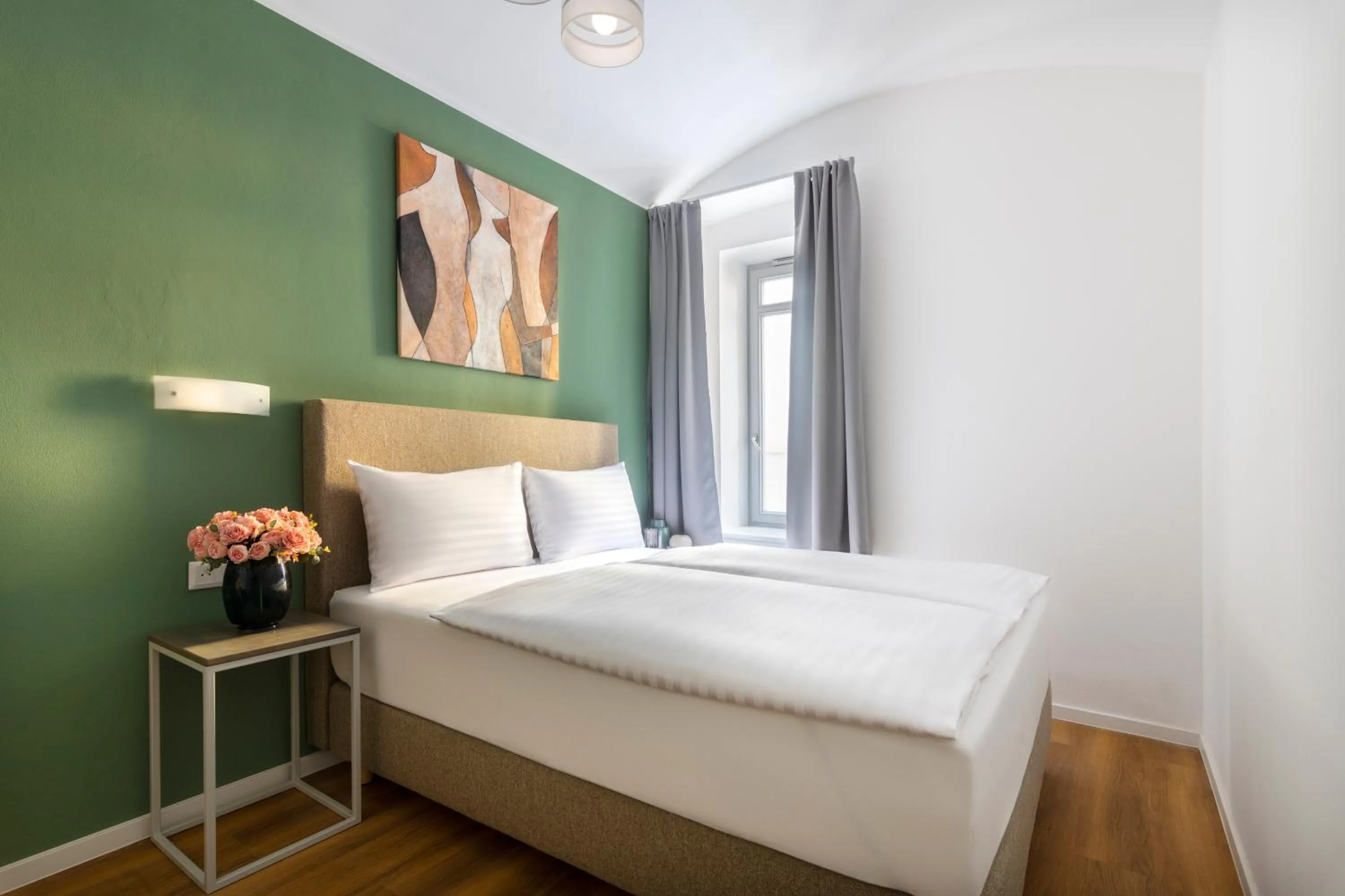 Bed in Hidden Art Boutique Residence by Dwellfort