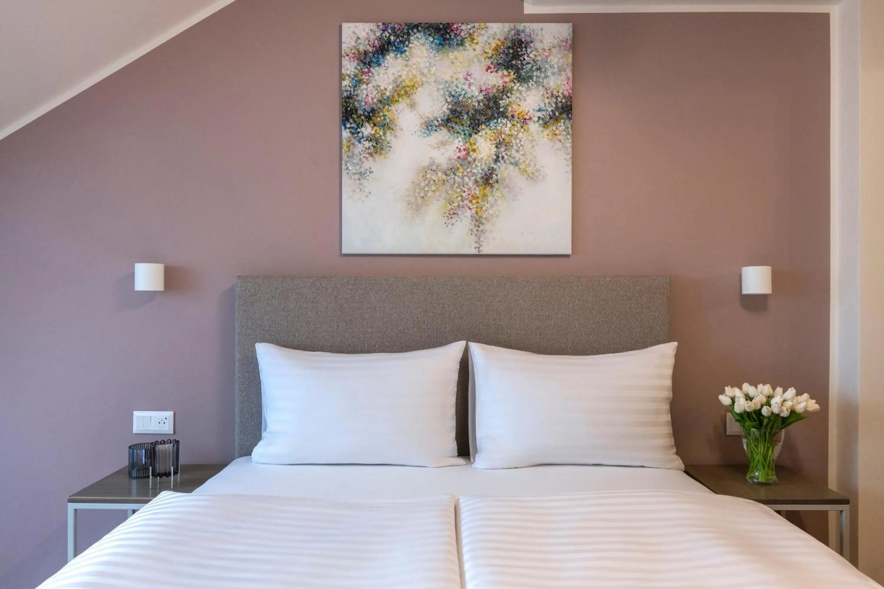 Bed in Hidden Art Boutique Residence by Dwellfort