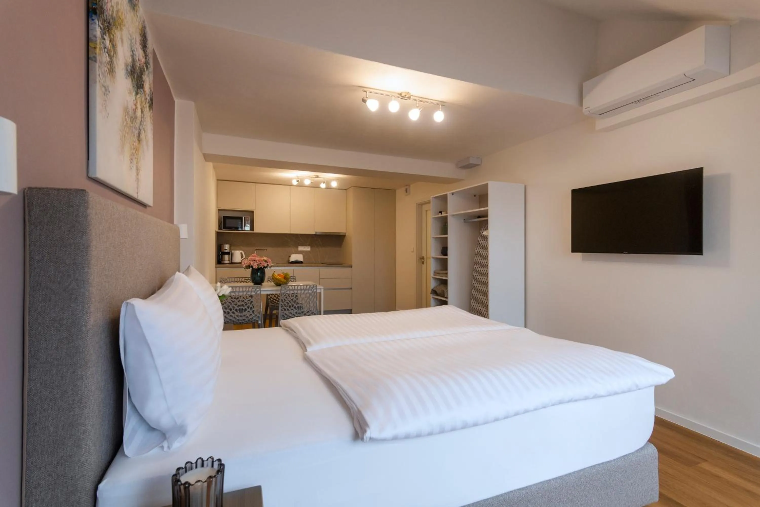 Bed in Hidden Art Boutique Residence by Dwellfort