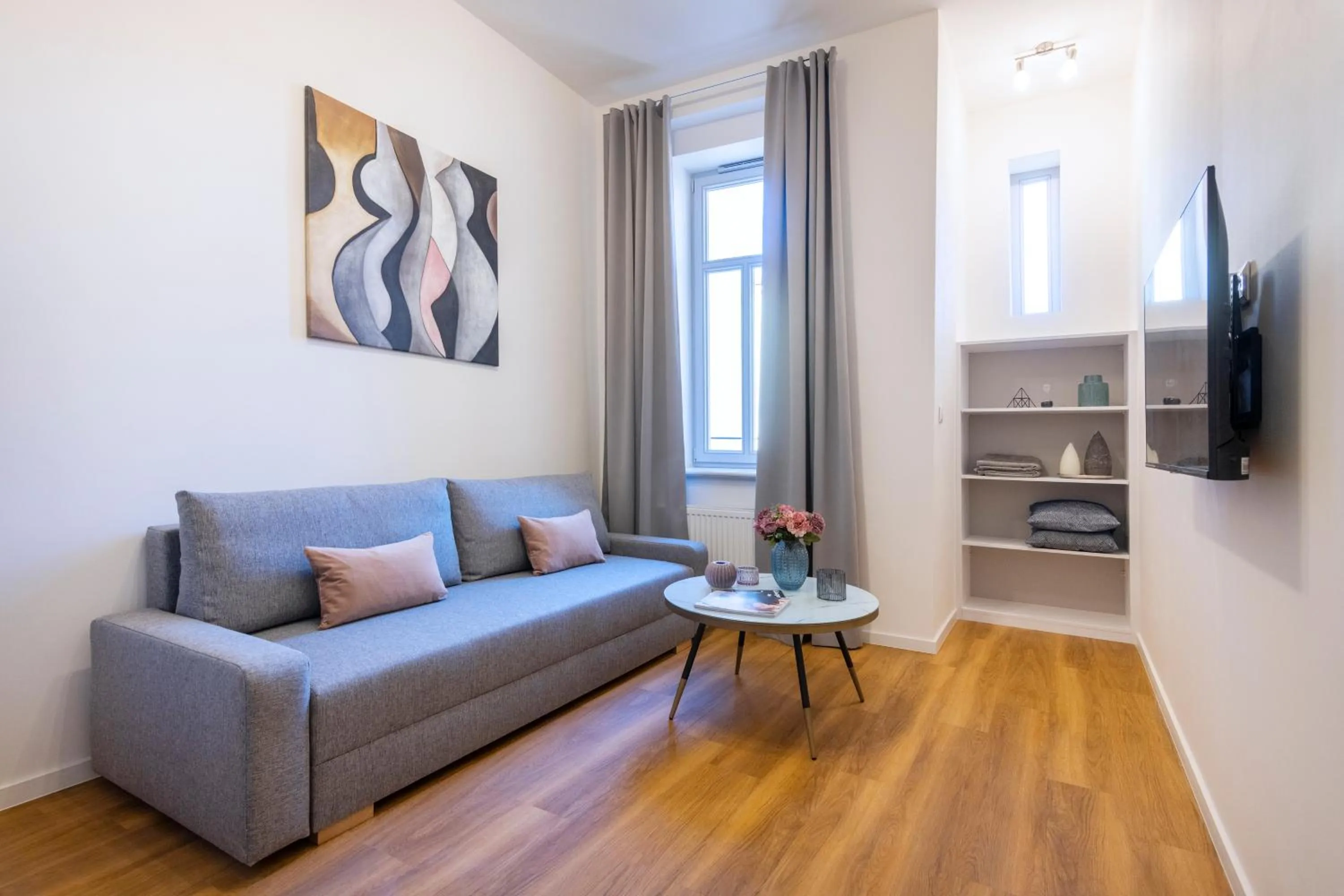 TV and multimedia in Hidden Art Boutique Residence by Dwellfort