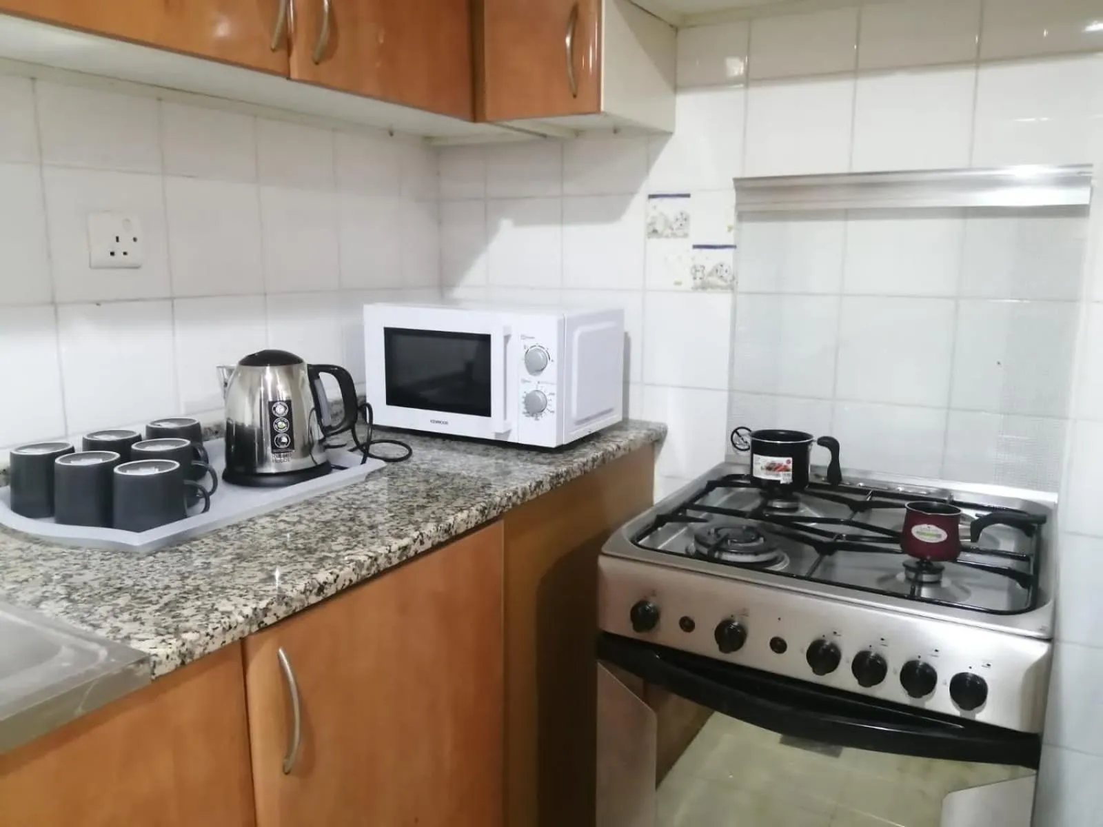 Coffee/tea facilities in AlBarsha 1 Hostel by PHM