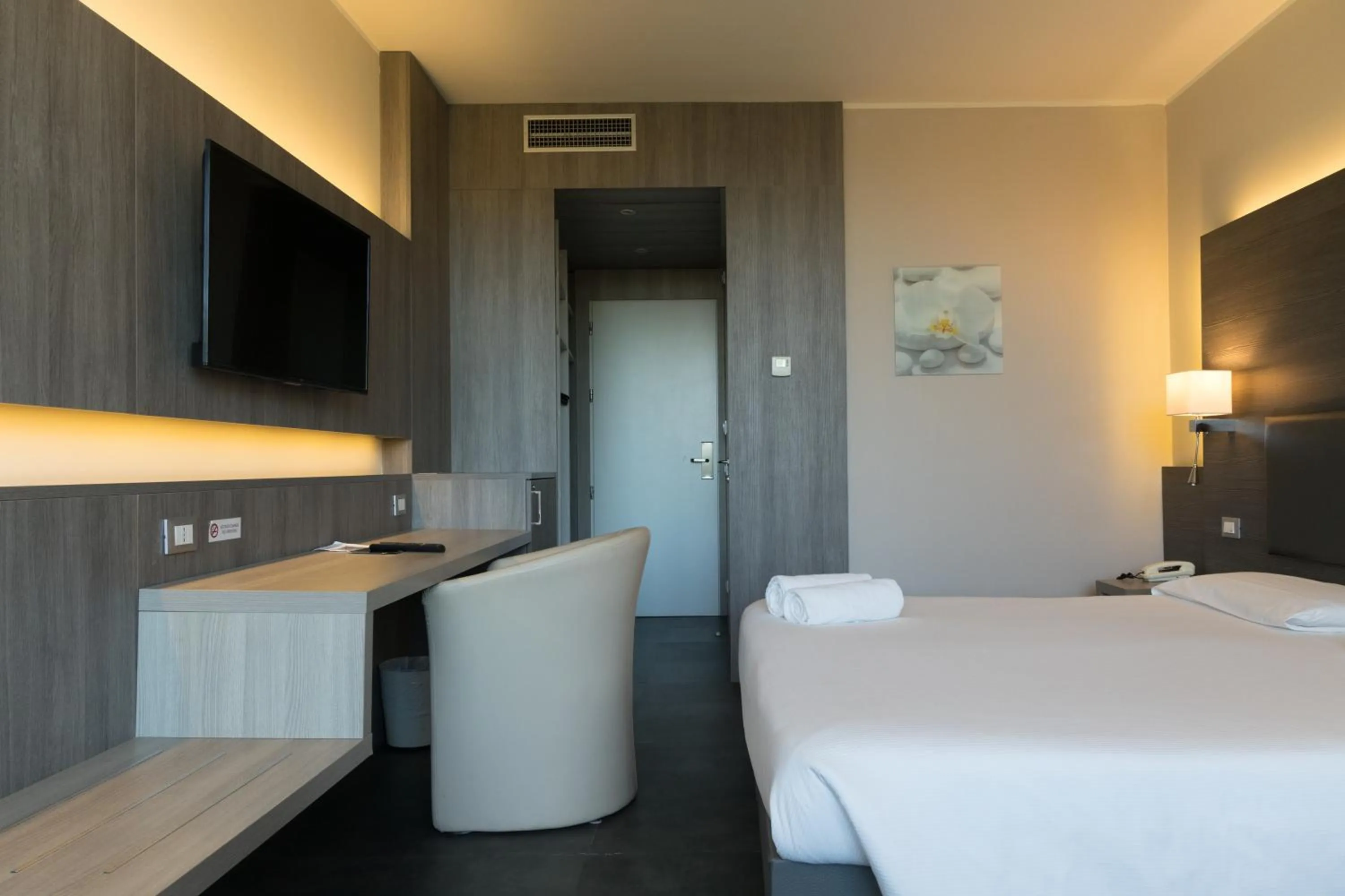 Bedroom, Bed in Poggio Hotel