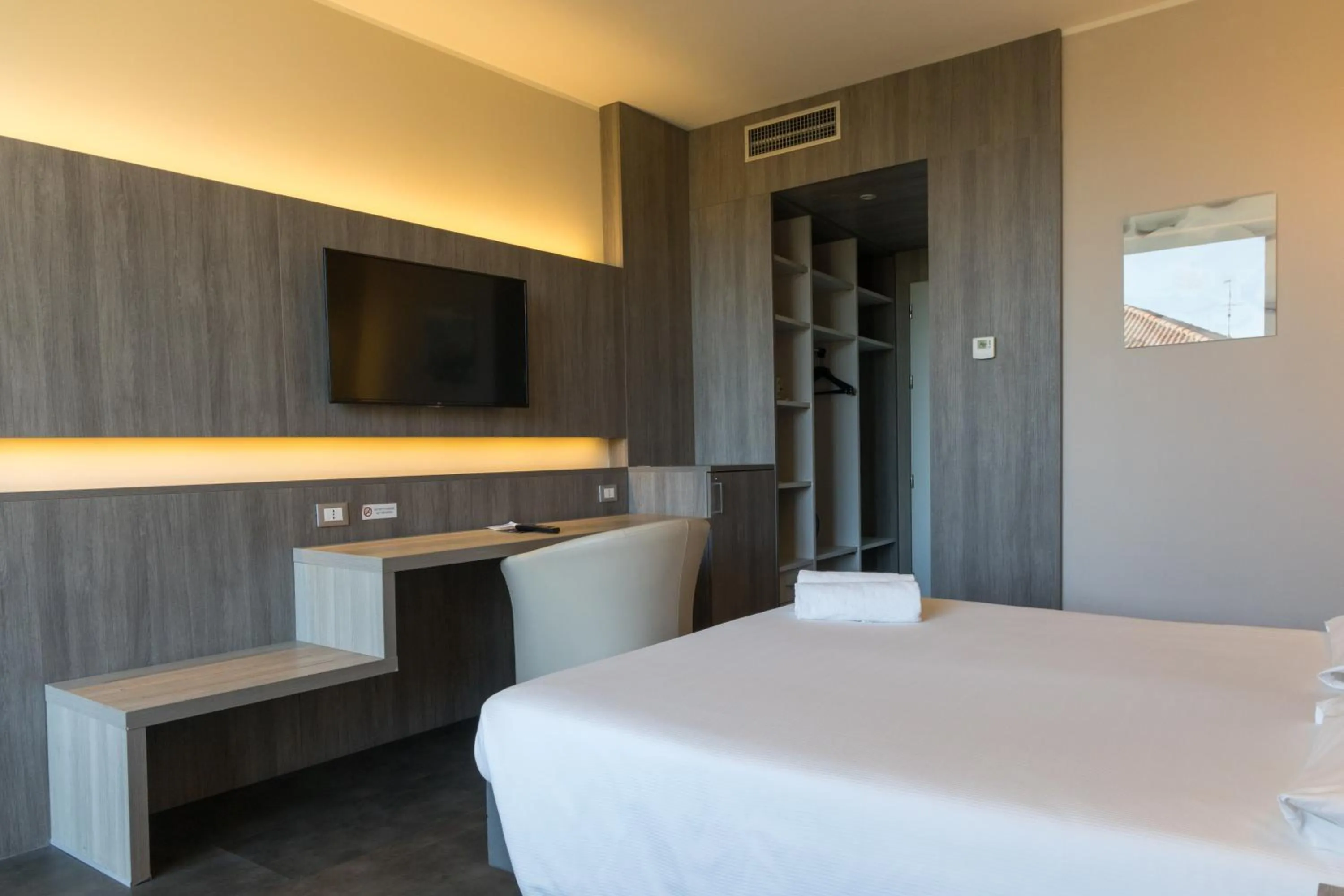 Bedroom, Bed in Poggio Hotel