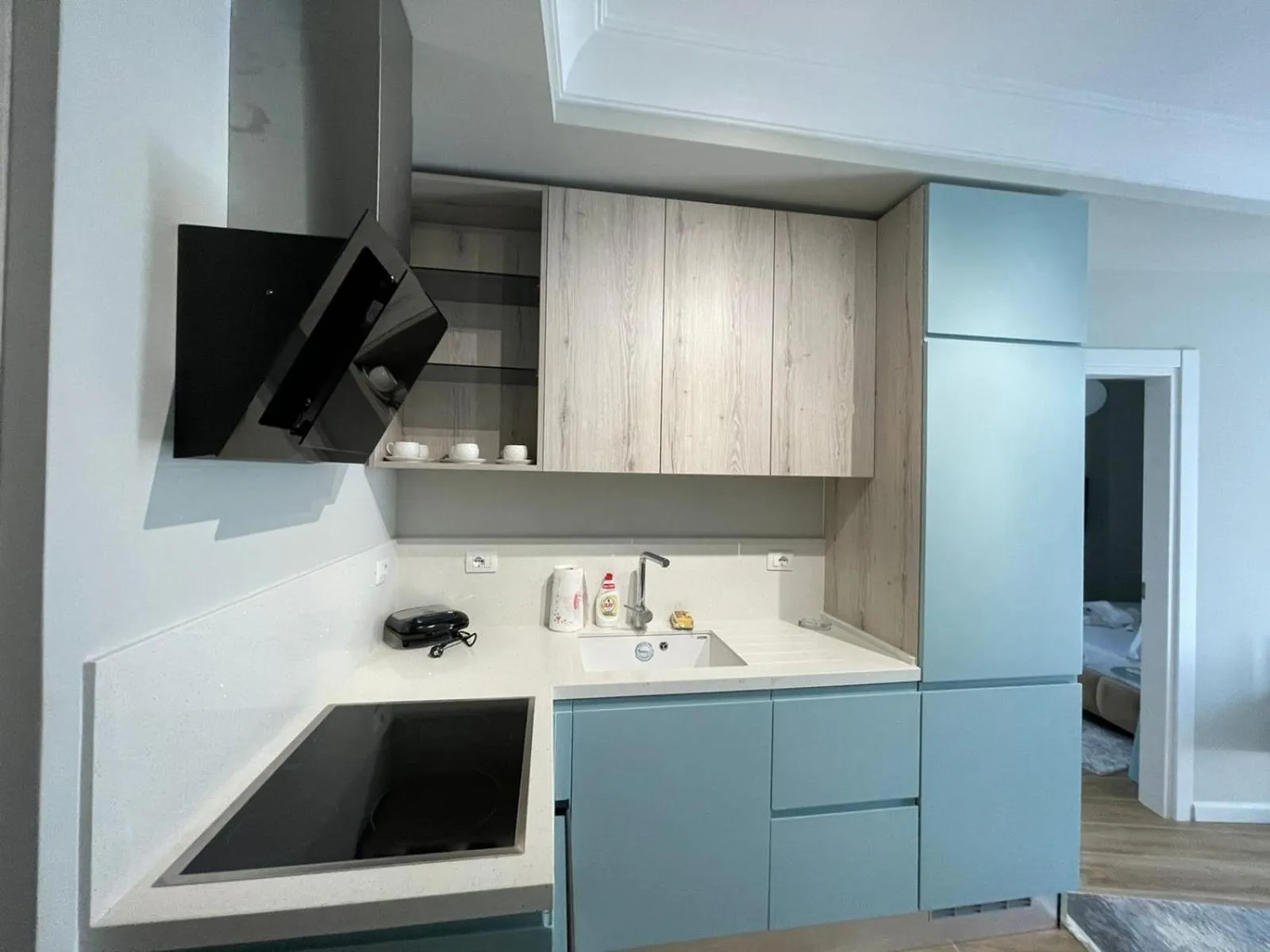 kitchen in Blissful Apartments