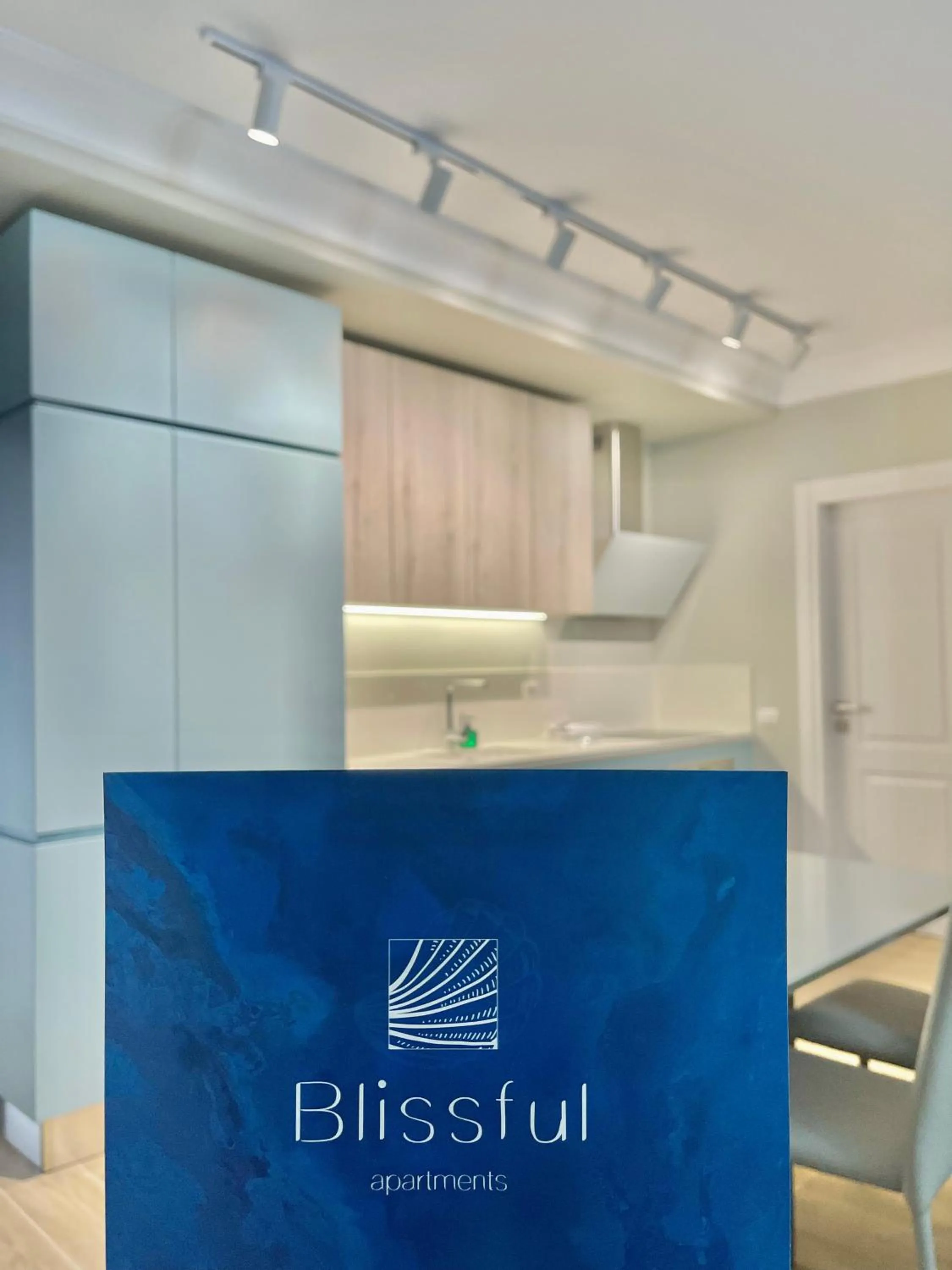 Property logo or sign in Blissful Apartments