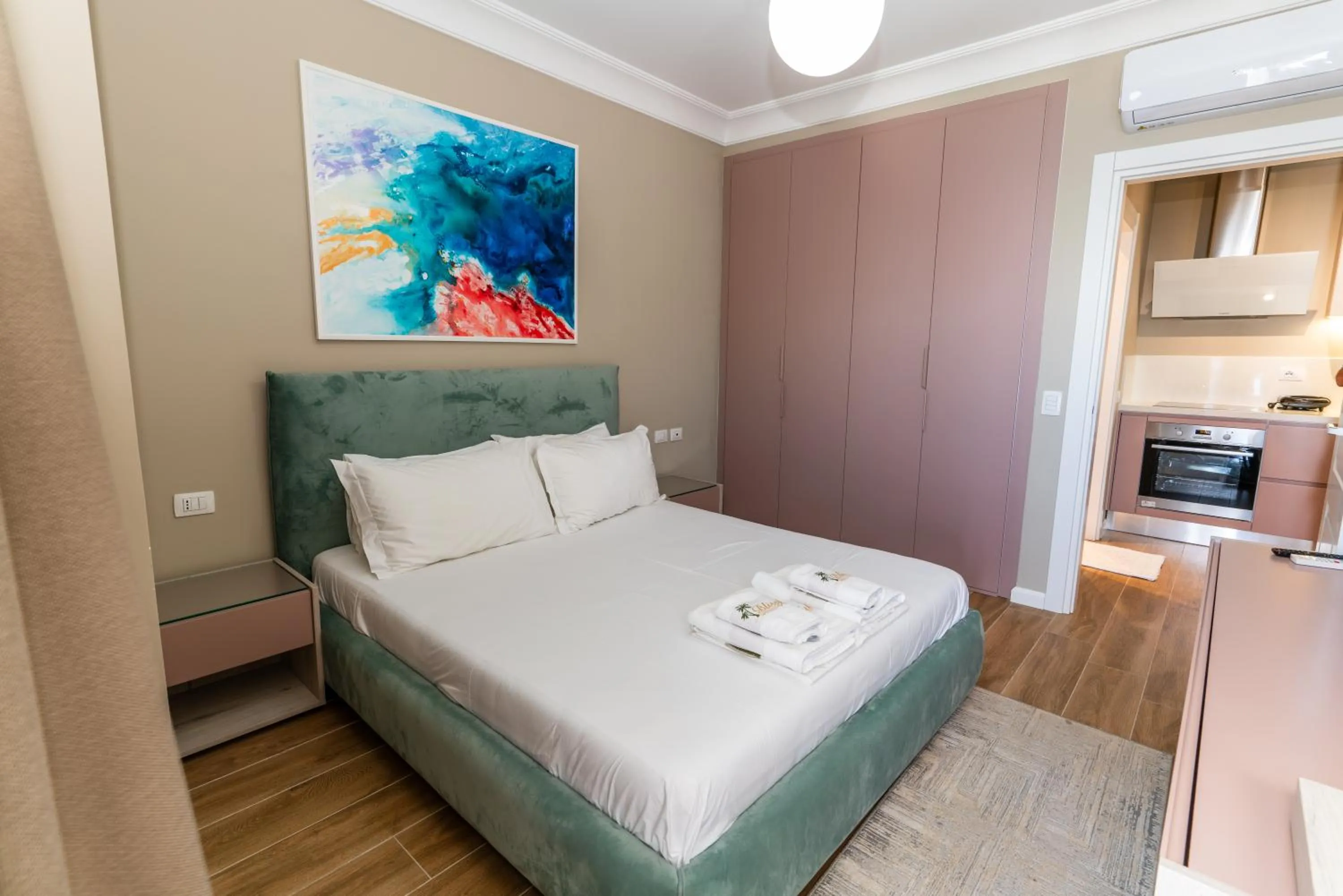 Bed in Blissful Apartments