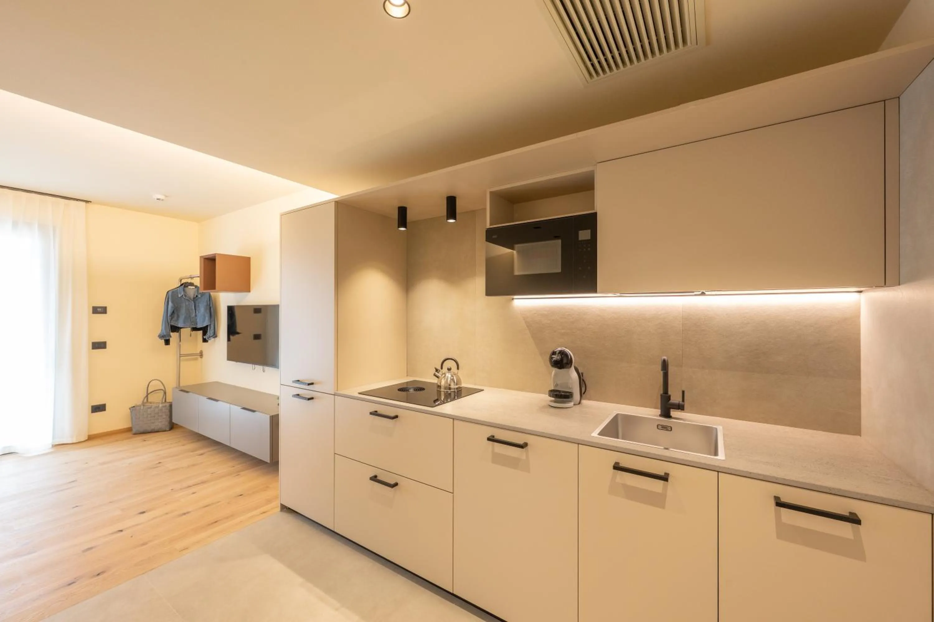 Kitchen or kitchenette, Bed in Etra Suites & Apartments