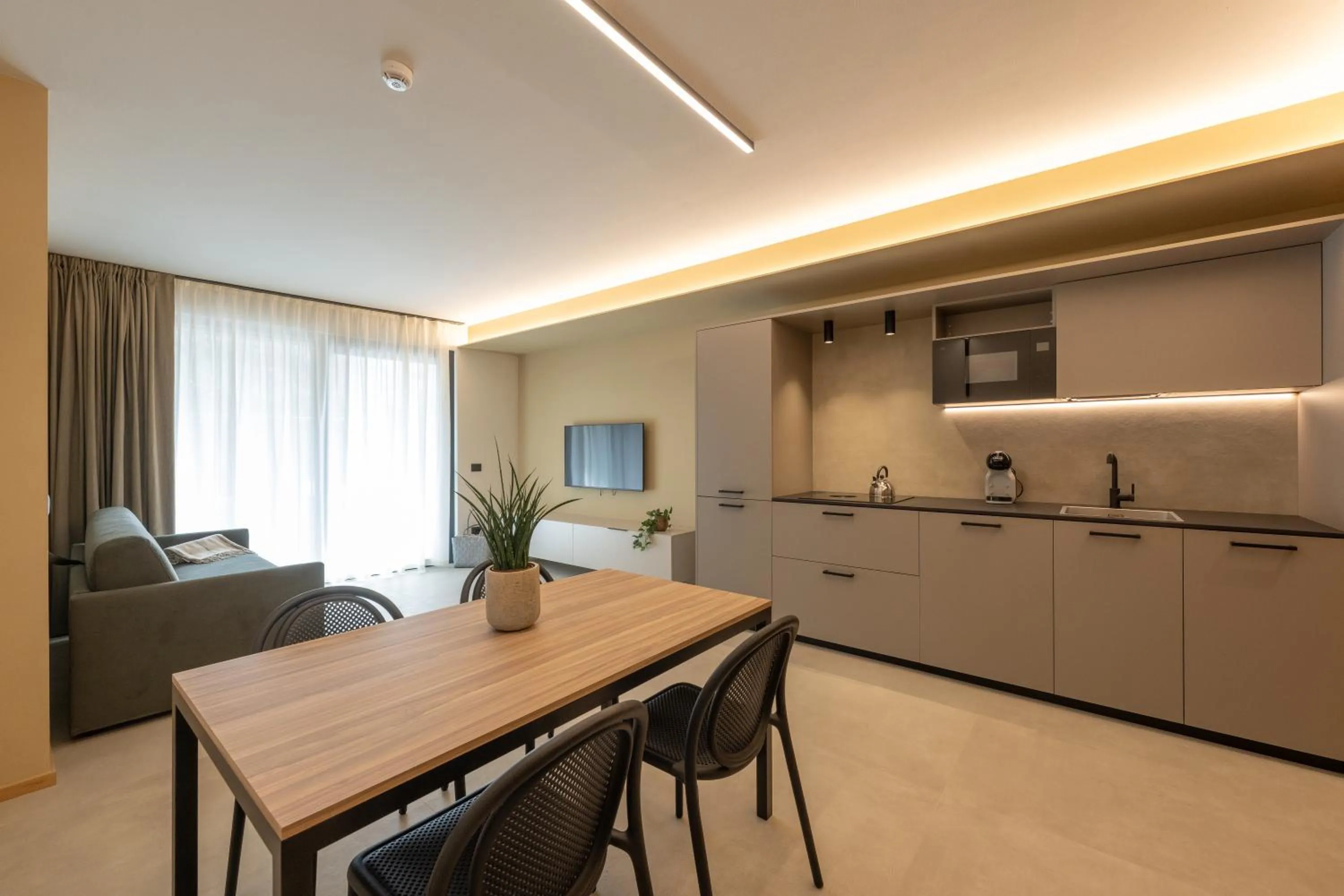 Kitchen or kitchenette in Etra Suites & Apartments