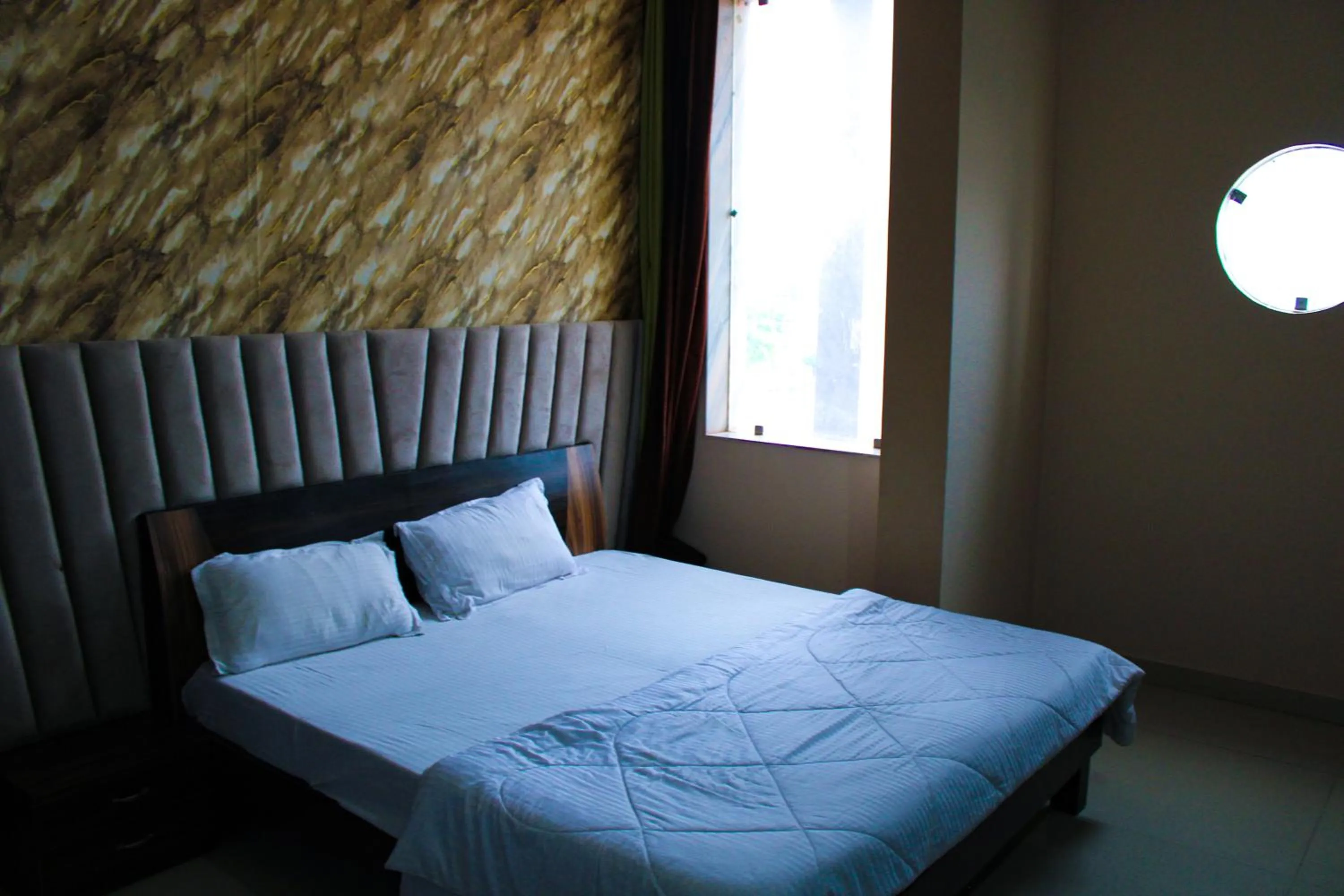 Bed in Sangam Hotel