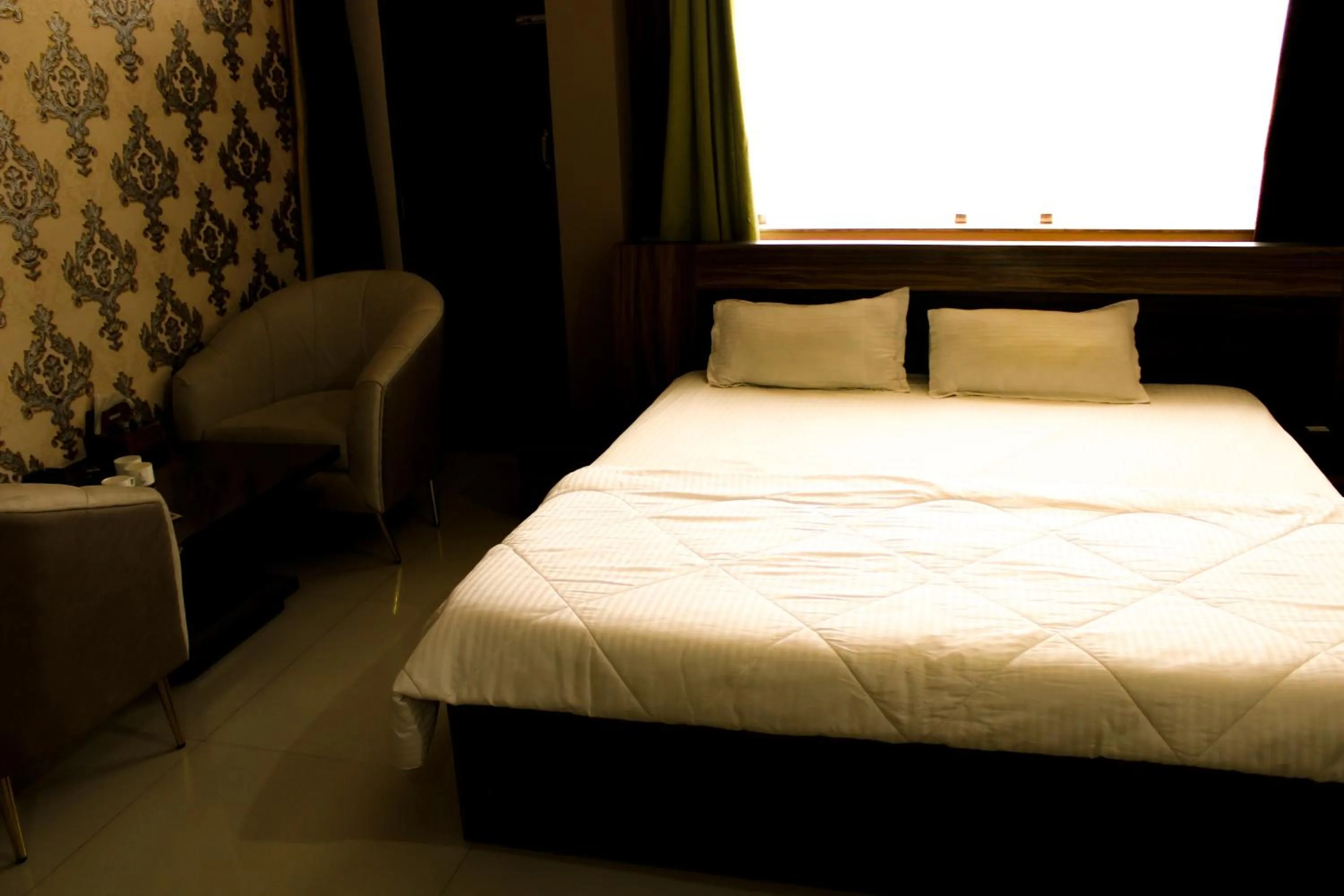 Bed in Sangam Hotel