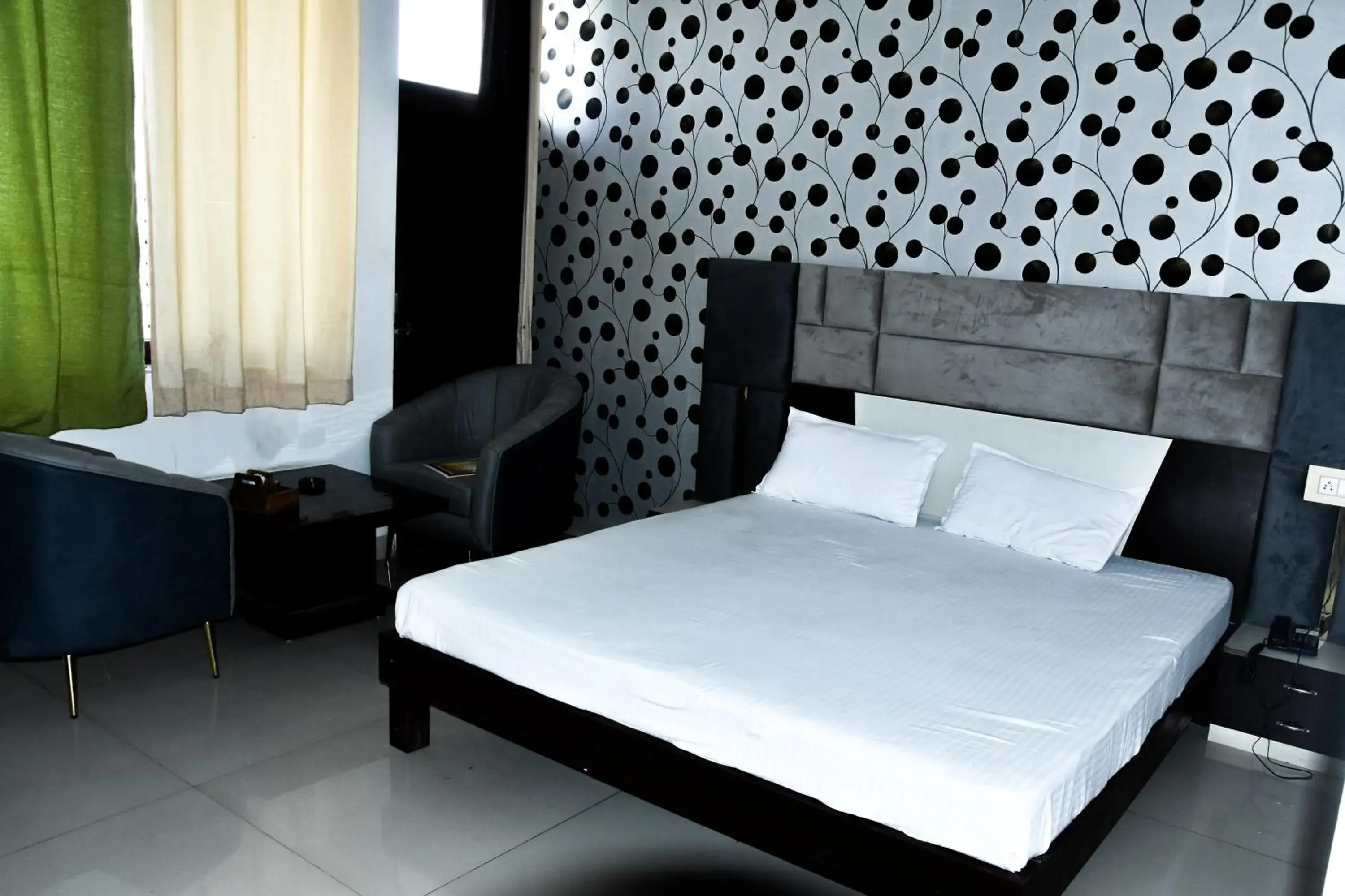 View (from property/room), Bed in Sangam Hotel View (from property/room), Bed in Sangam Hotel