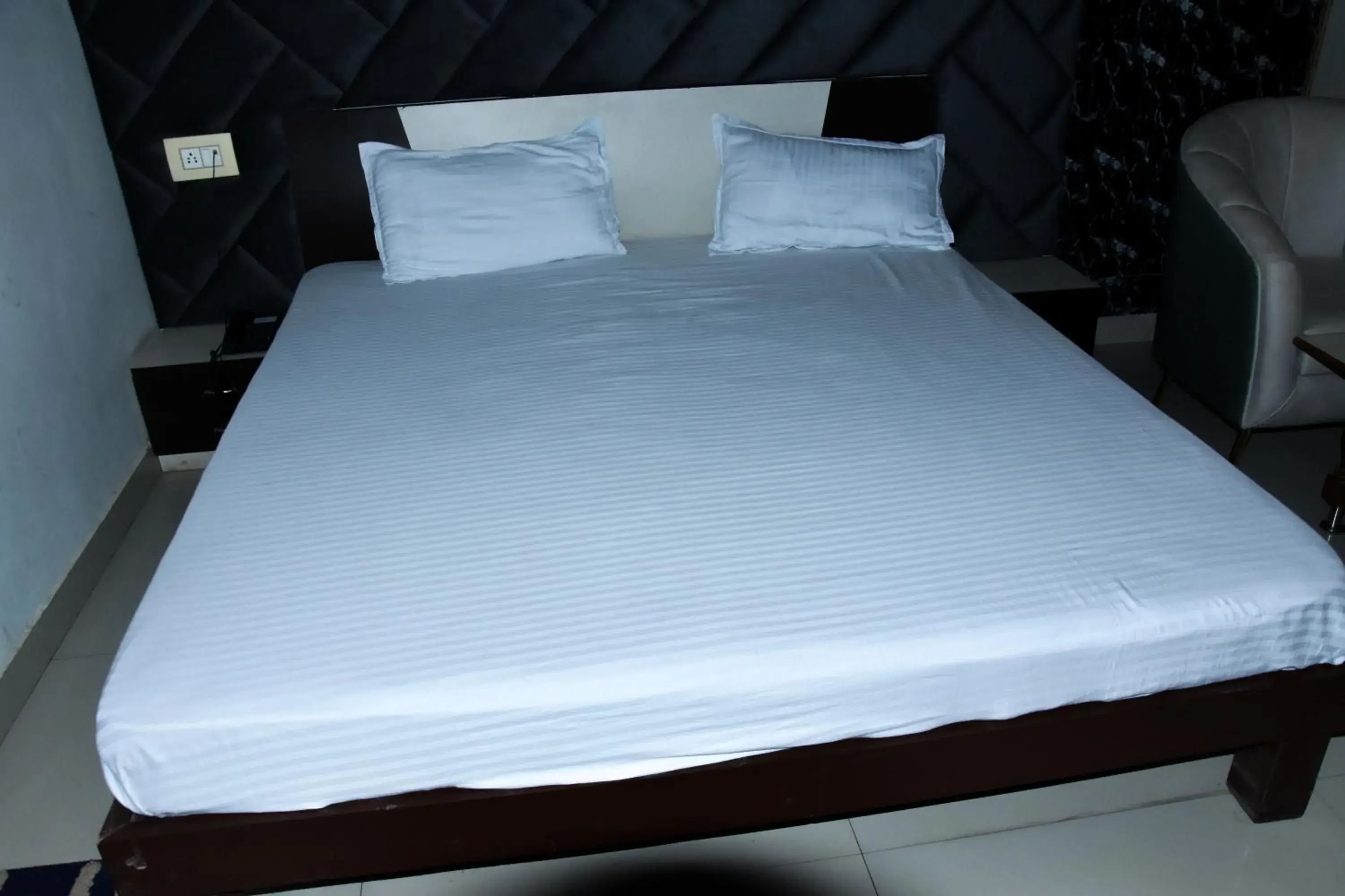 Bed in Sangam Hotel Bed in Sangam Hotel