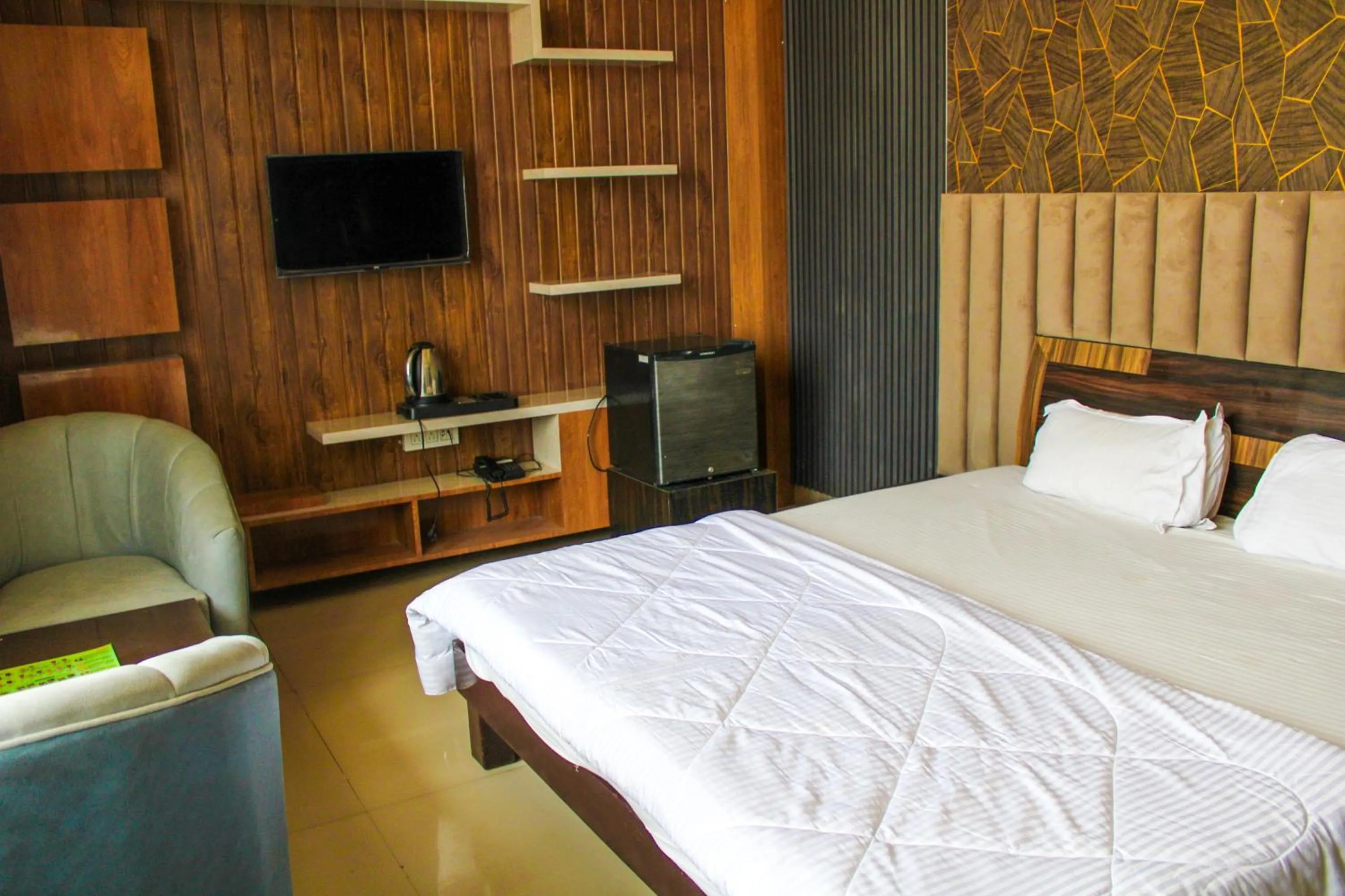 Bed in Sangam Hotel