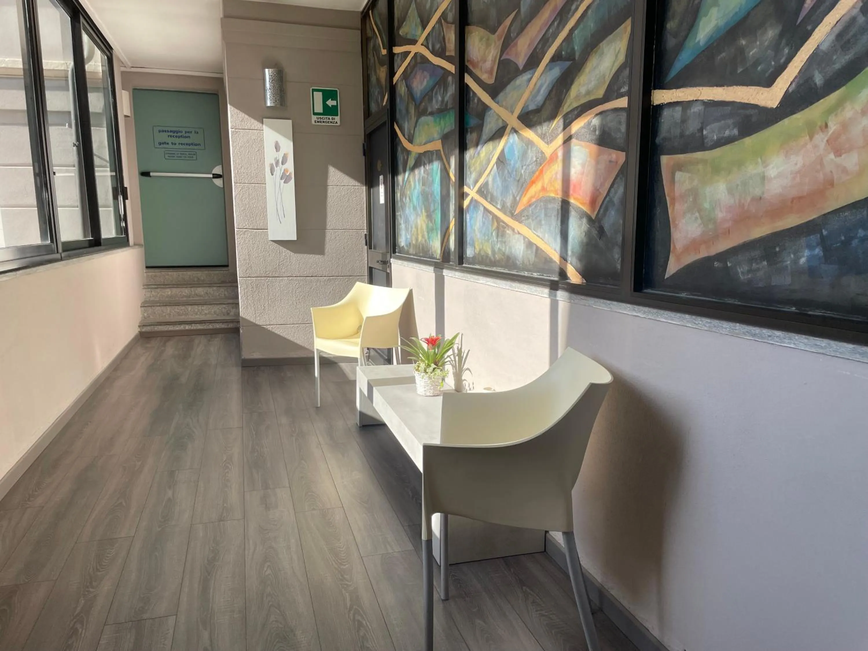 Communal lounge/ TV room in Hotel Europa Varese