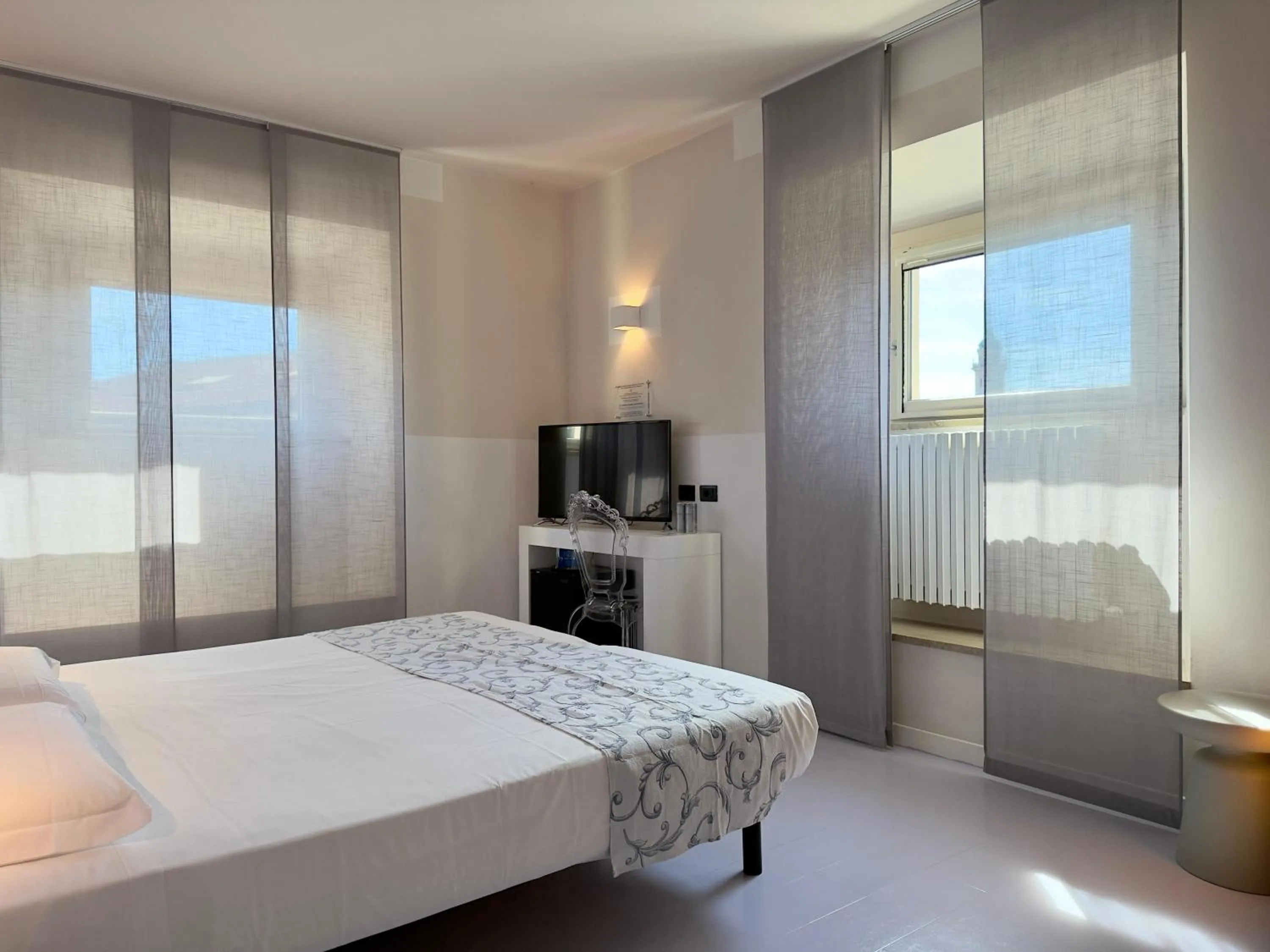 Photo of the whole room, Bed in Hotel Europa Varese