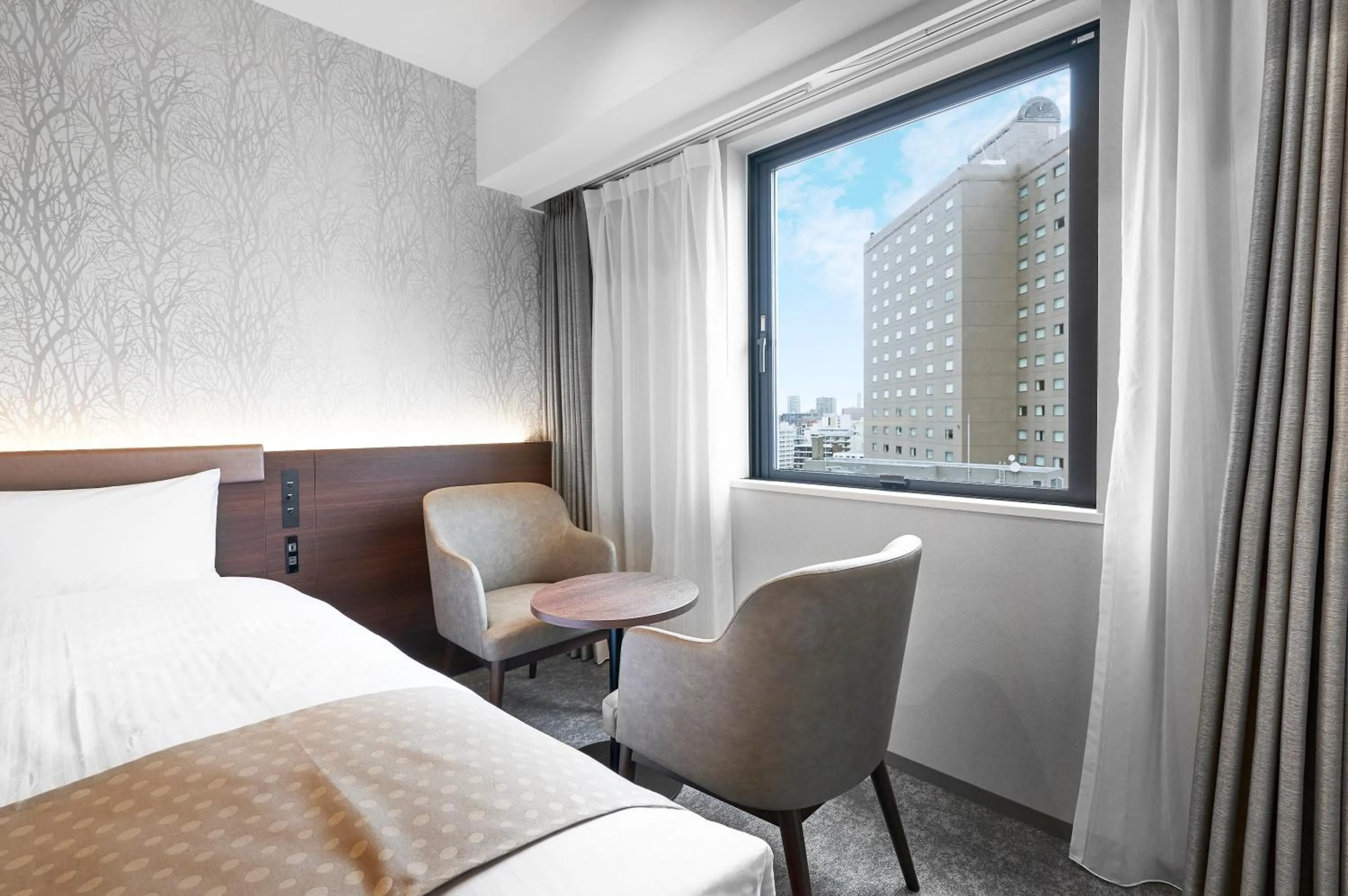 Photo of the whole room, Bed in Daiwa Roynet Hotel Sapporo Nakajima Koen