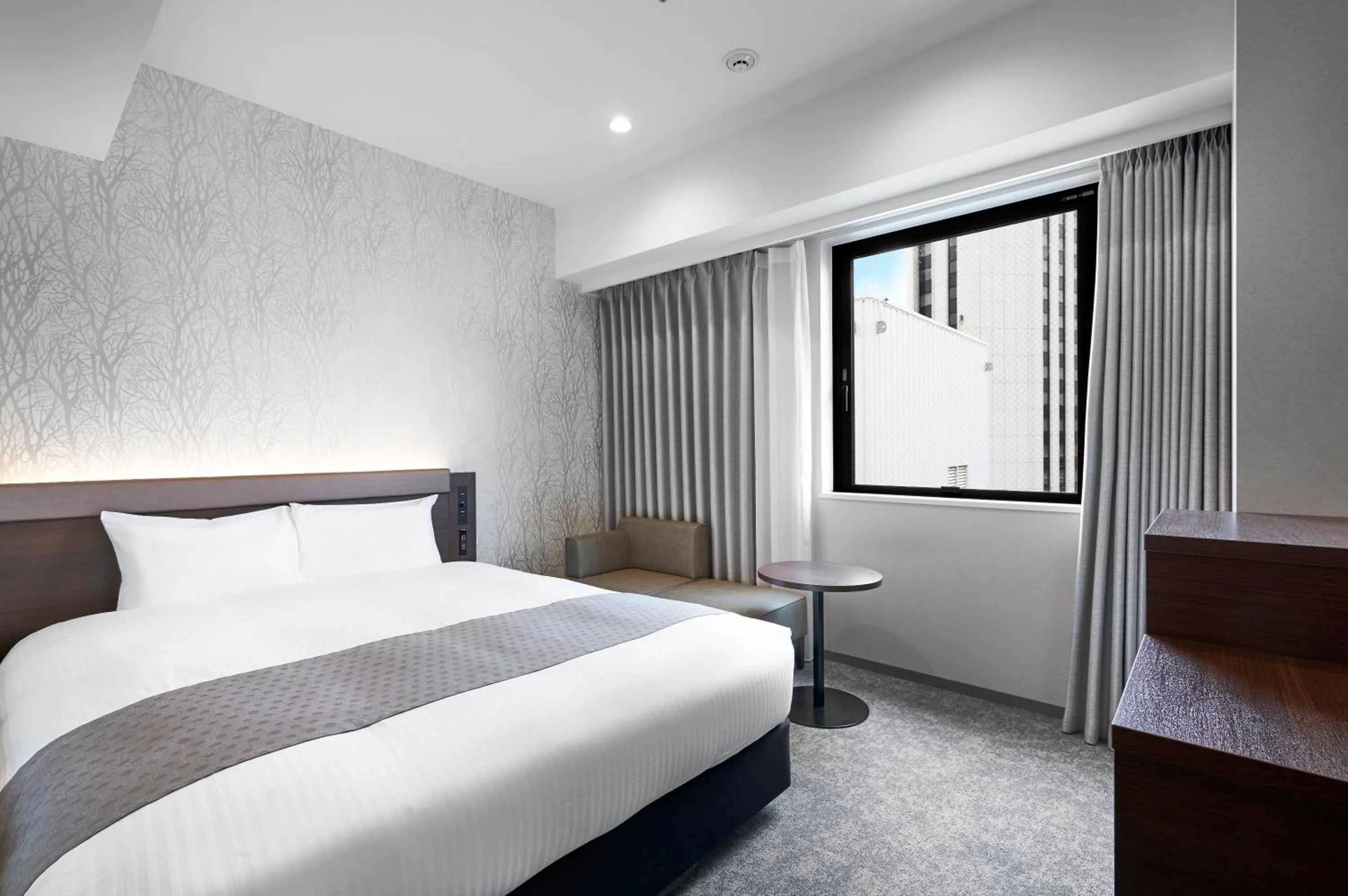 Photo of the whole room, Bed in Daiwa Roynet Hotel Sapporo Nakajima Koen