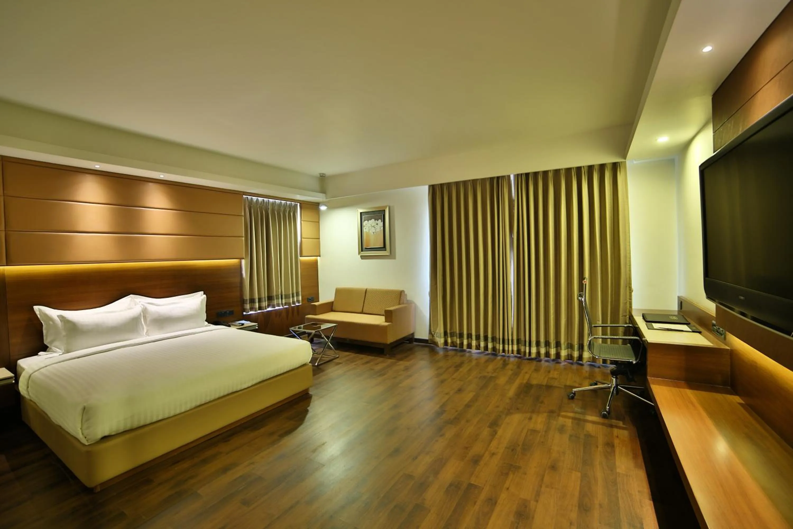 Communal lounge/ TV room, Bed in HOTEL G EXPRESS Formerly Known as TGB Express