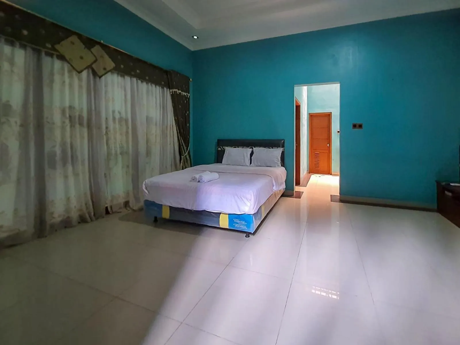 Bed in Pakde air cafe and homestay Grabag Magelang Mitra RedDoorz