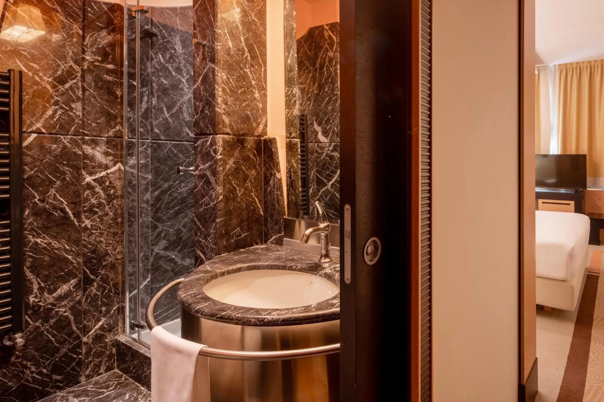 Bathroom in UNA Hotels Malpensa