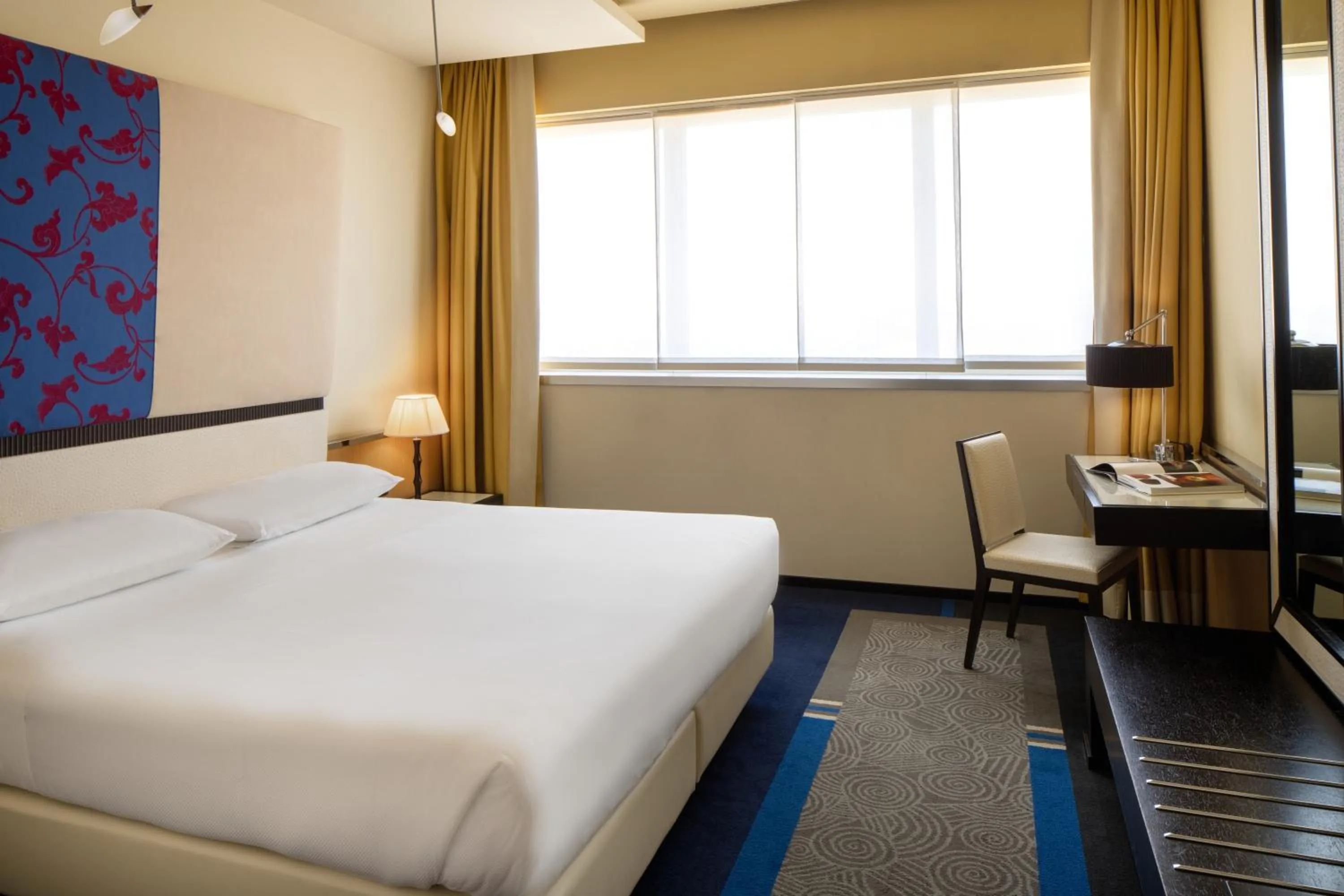 Bed in UNA Hotels Malpensa