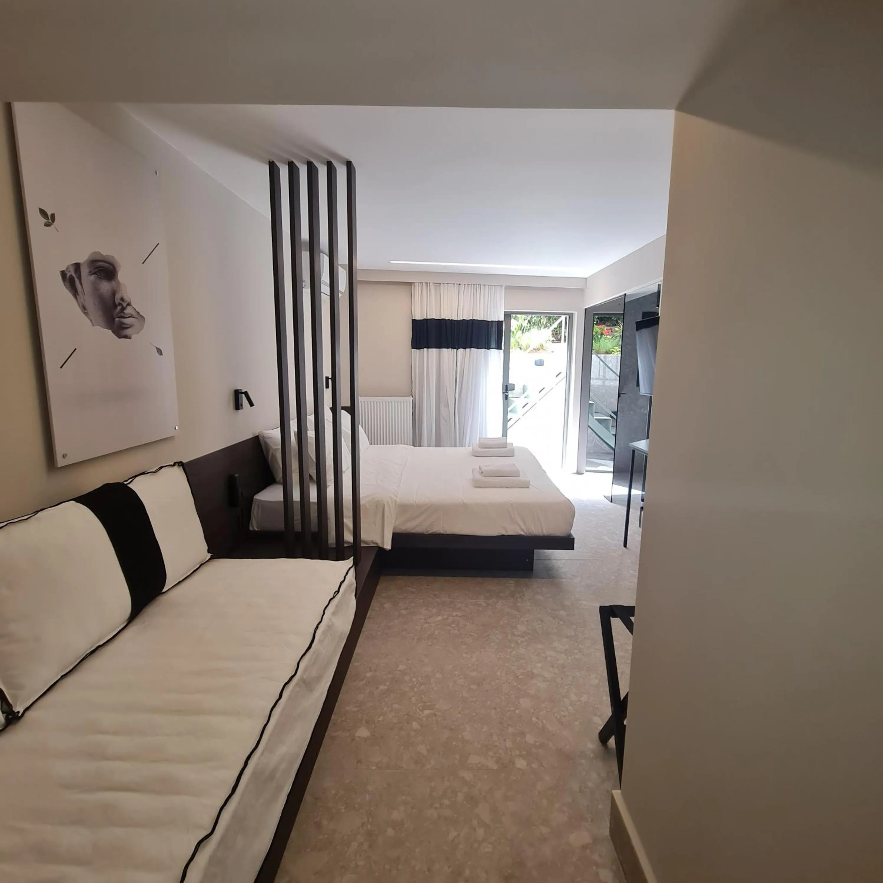 Photo of the whole room, Bed in Cityzoe Athens Suites