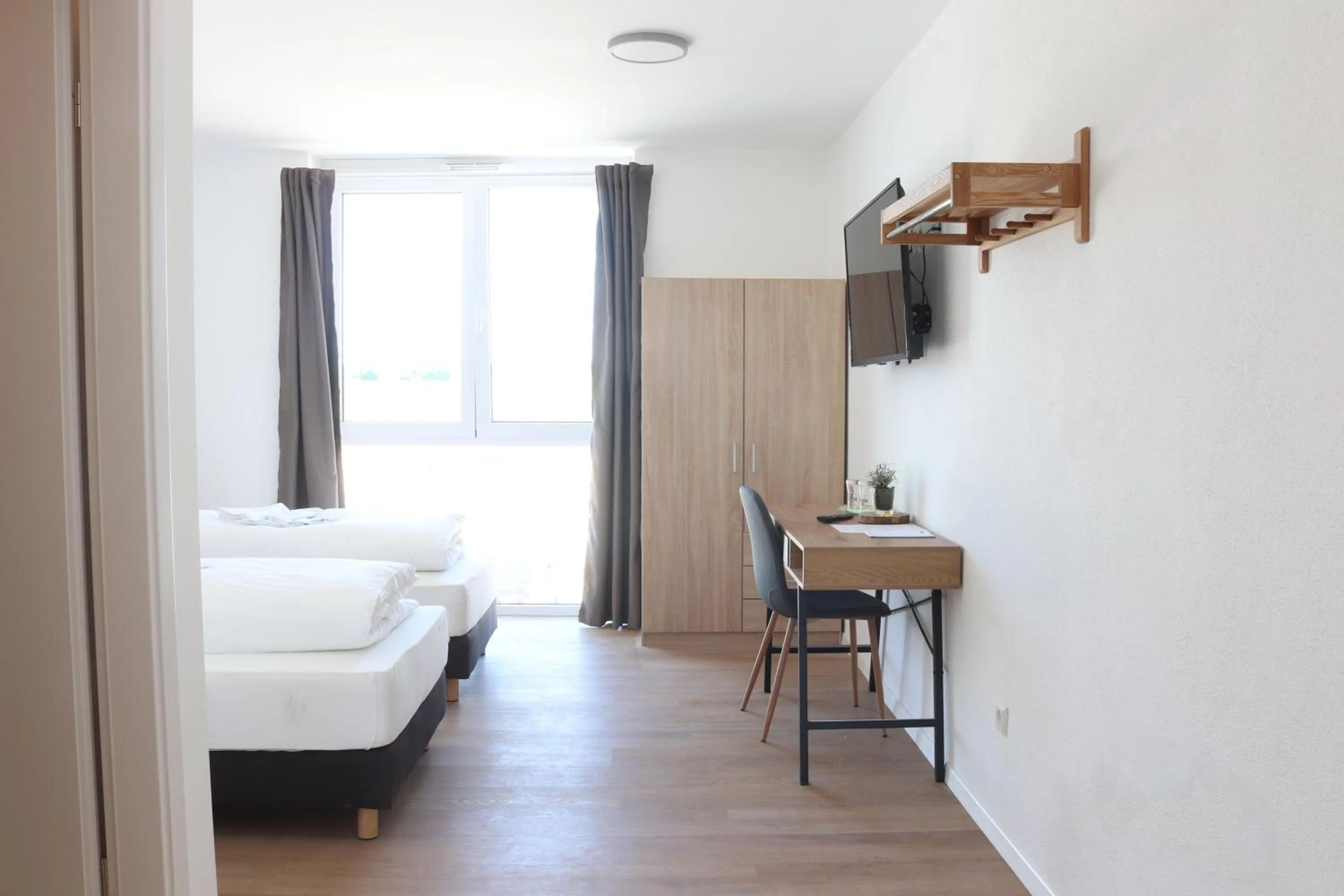 TV and multimedia, Bed in Motel Bergtheim - Self Check-in