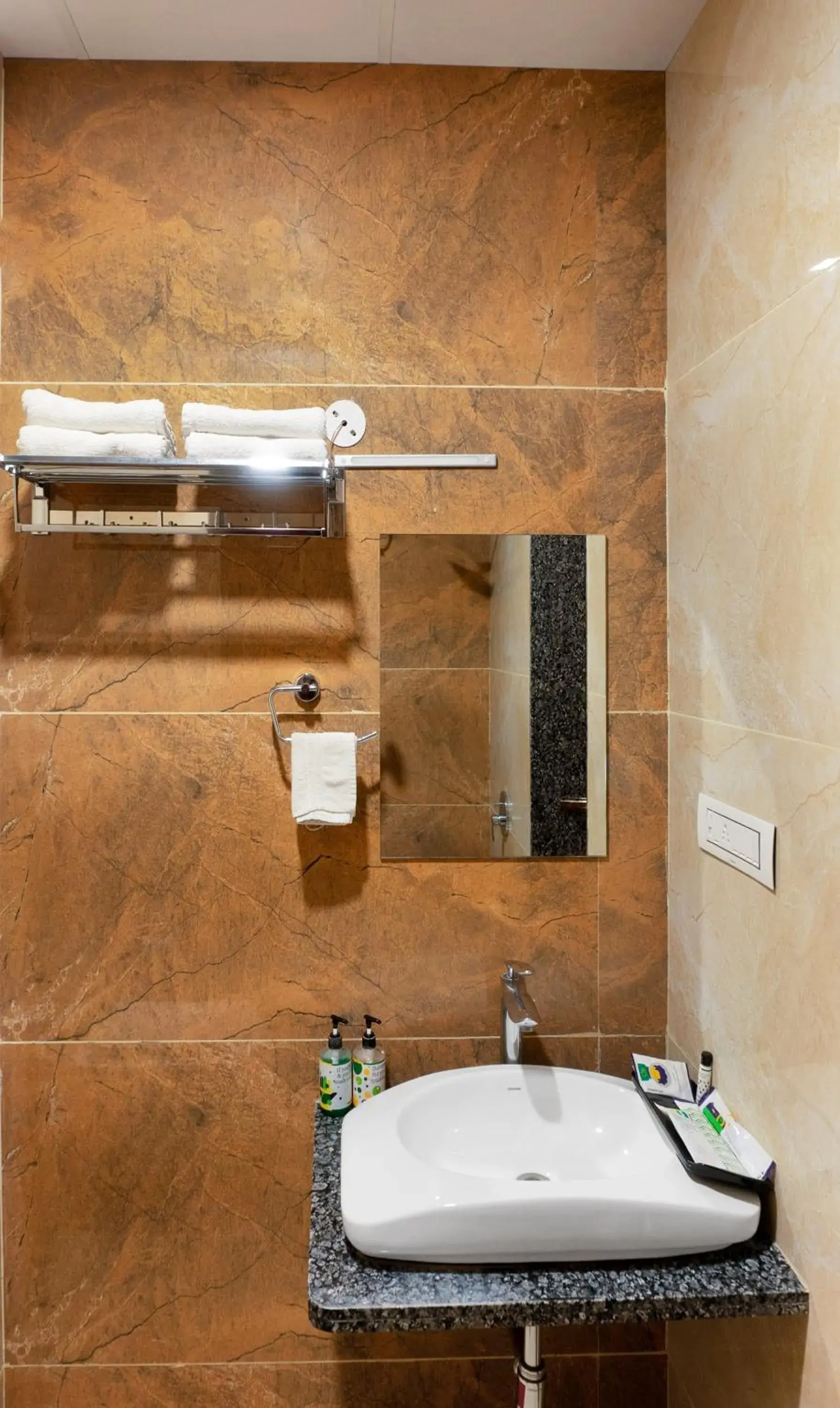 Bathroom in Treebo Premium Royal Amar With Mountain View and Swimming Pool Bathroom in Treebo Premium Royal Amar With Mountain View and Swimming Pool