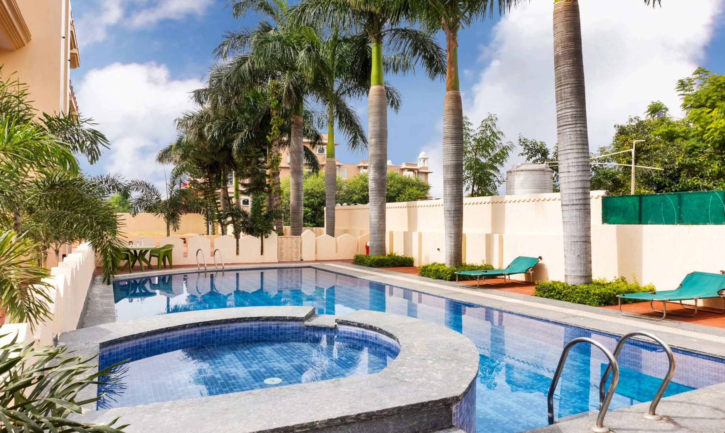 Swimming pool in Treebo Premium Royal Amar With Mountain View and Swimming Pool