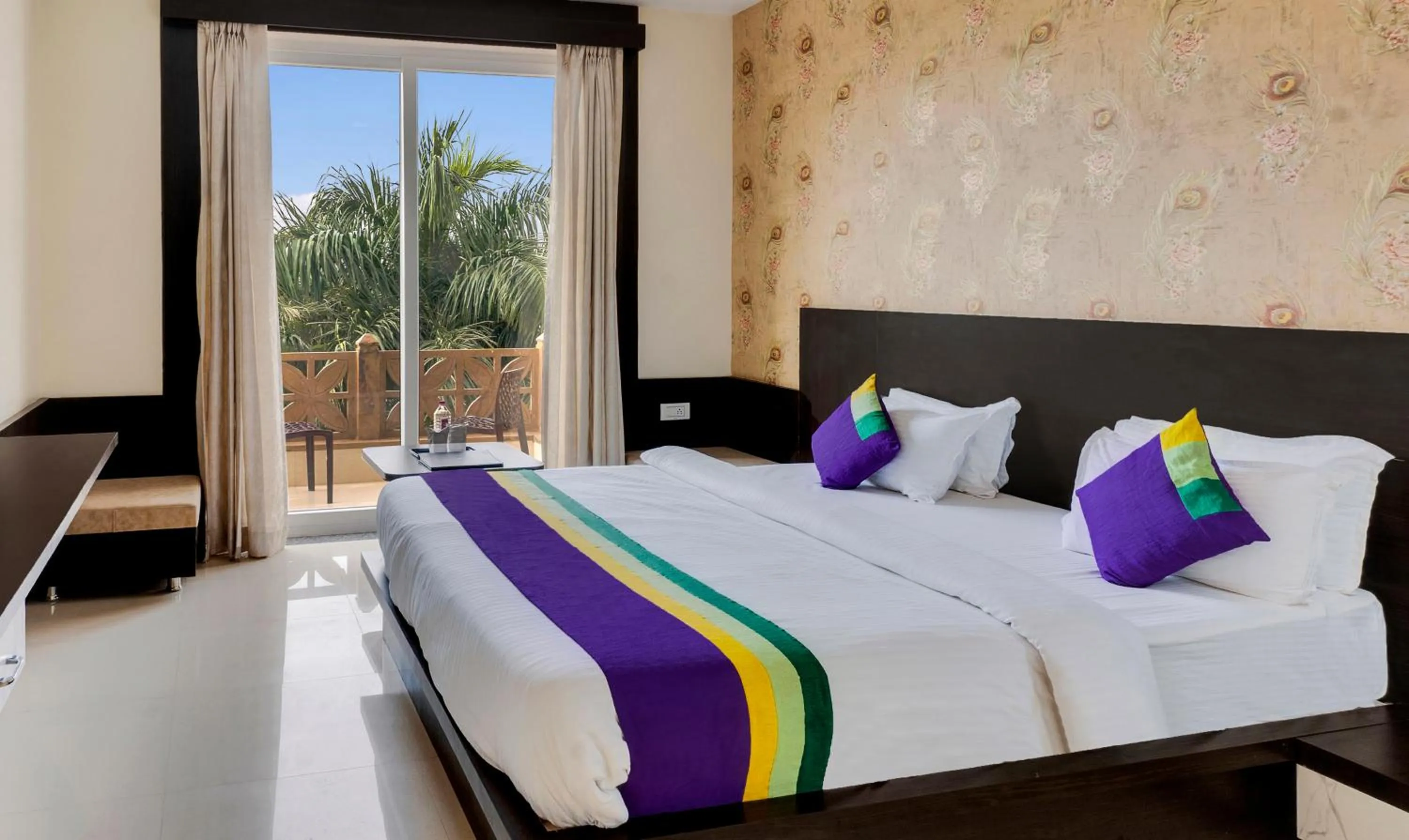 Bedroom, Bed in Treebo Premium Royal Amar With Mountain View and Swimming Pool