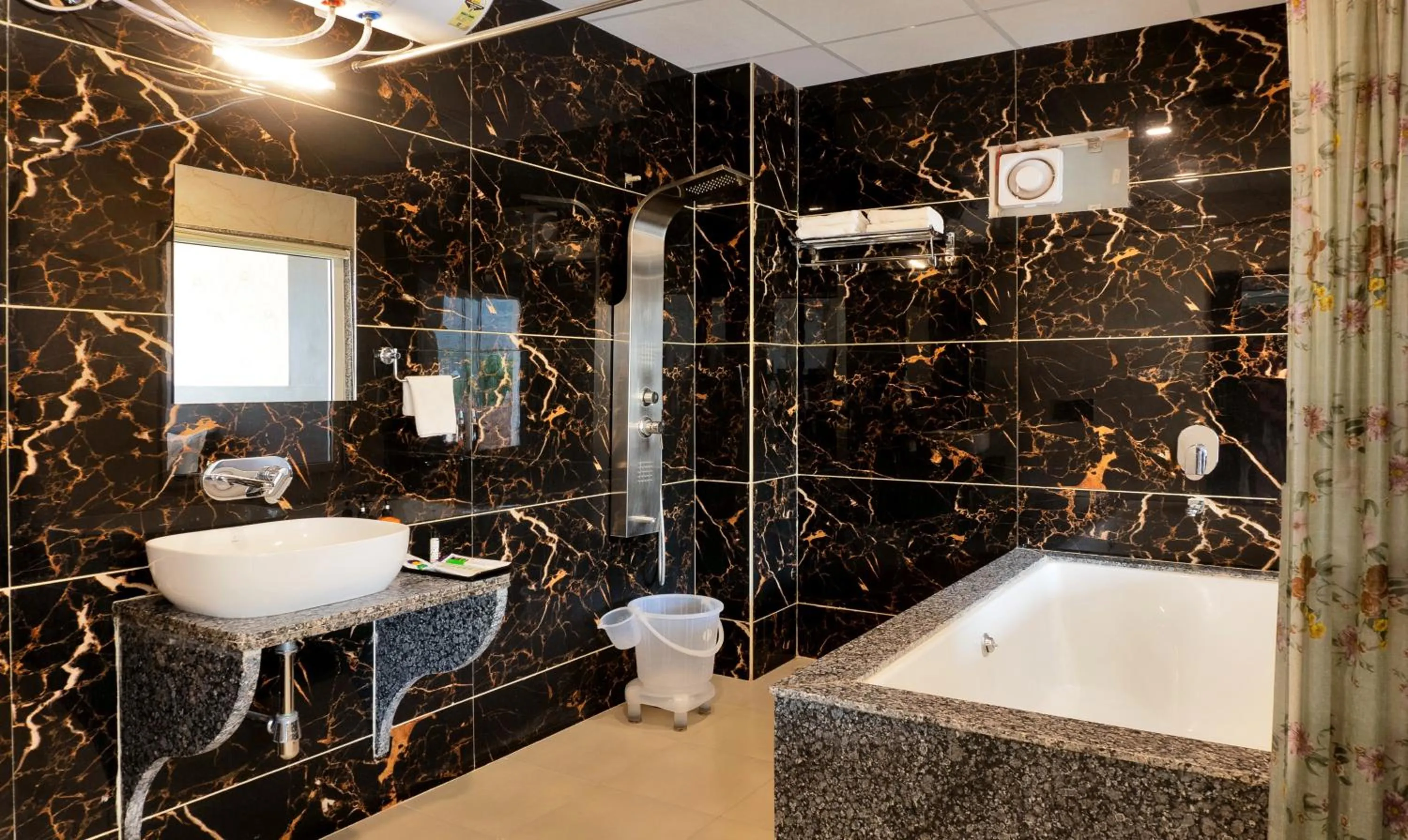 Bathroom in Treebo Premium Royal Amar With Mountain View and Swimming Pool