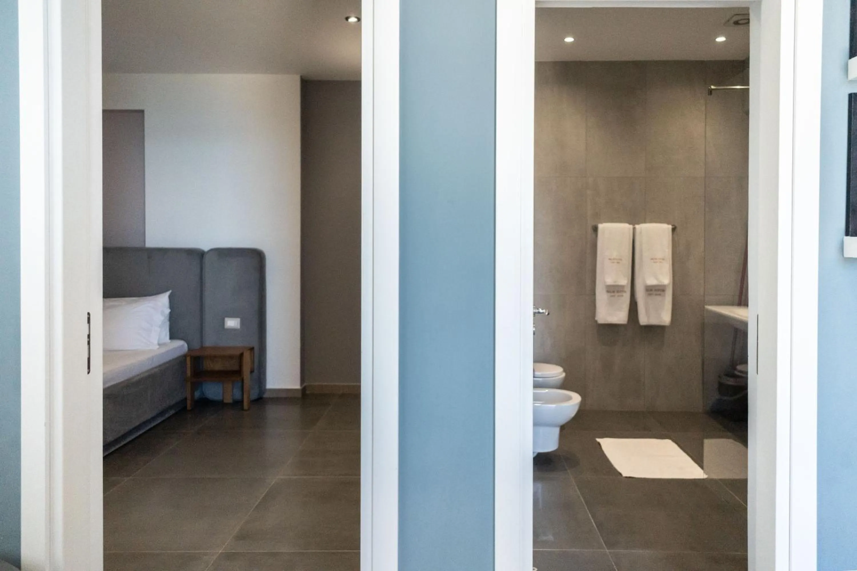 Bedroom in Palm Suites Apartment-Suite