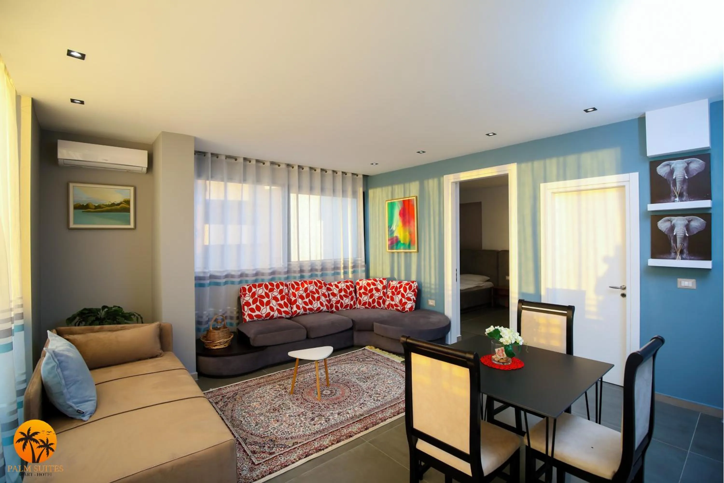 Living room in Palm Suites Apartment-Suite