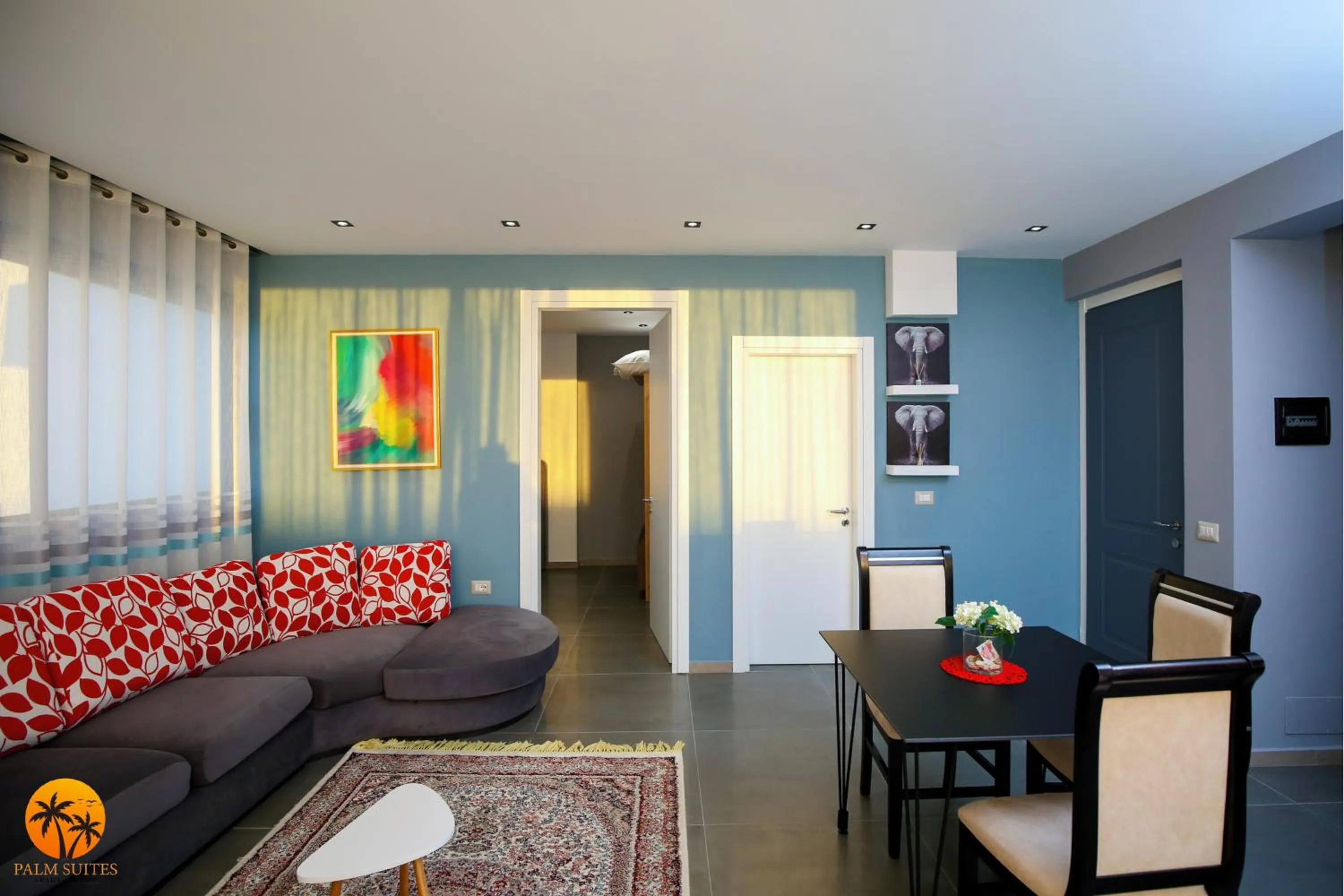 Living room in Palm Suites Apartment-Suite