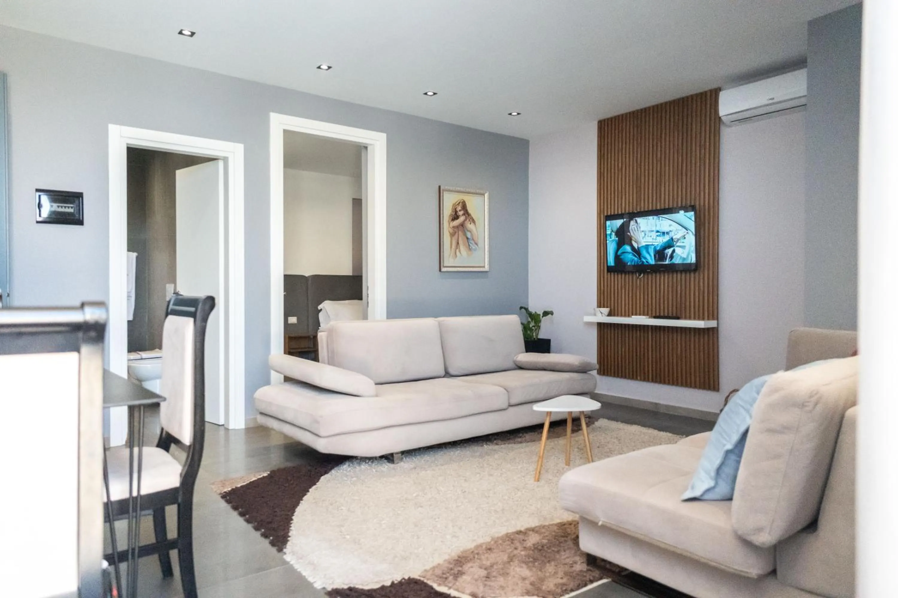 Living room in Palm Suites Apartment-Suite