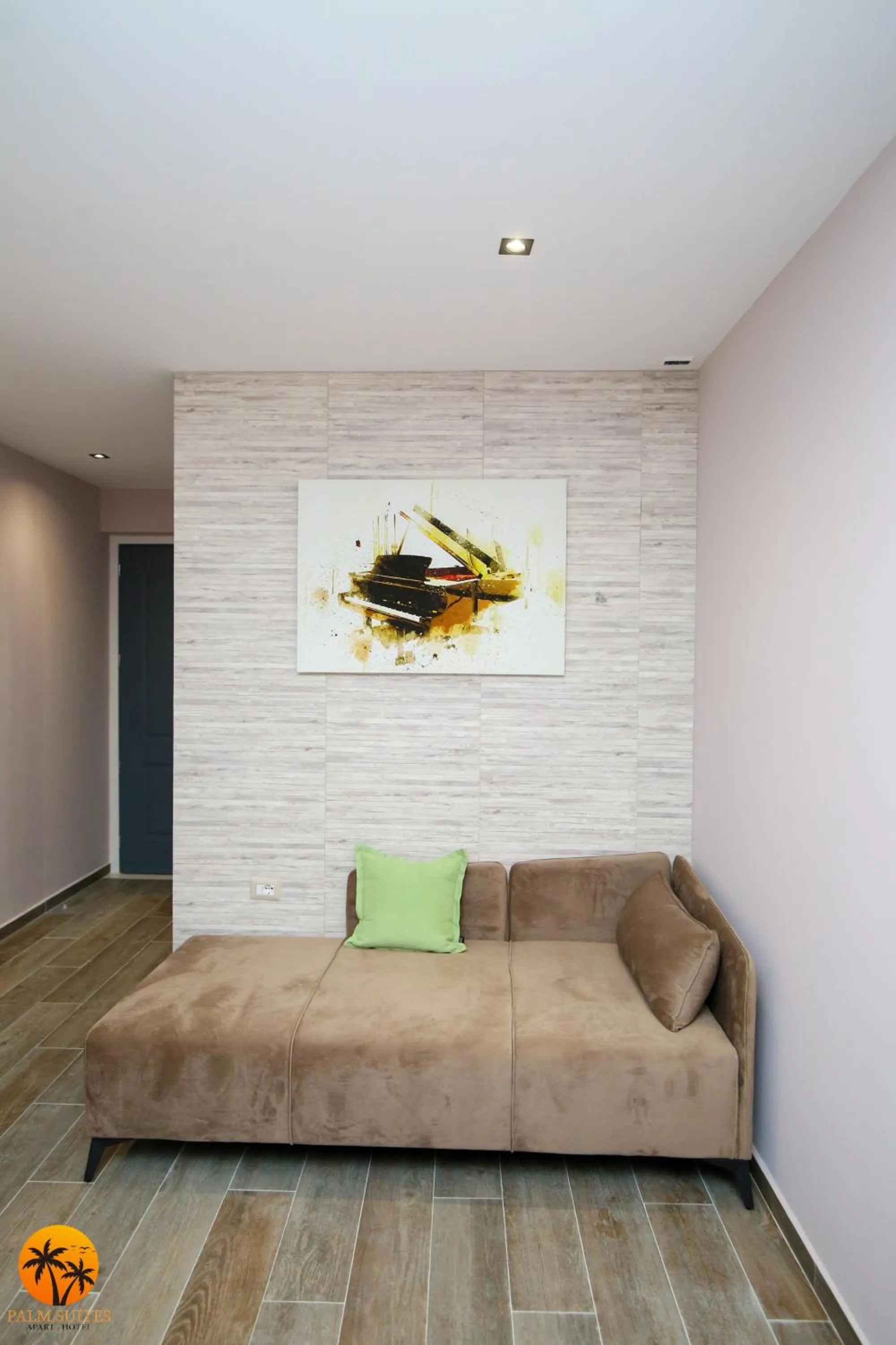 Bed in Palm Suites Apartment-Suite