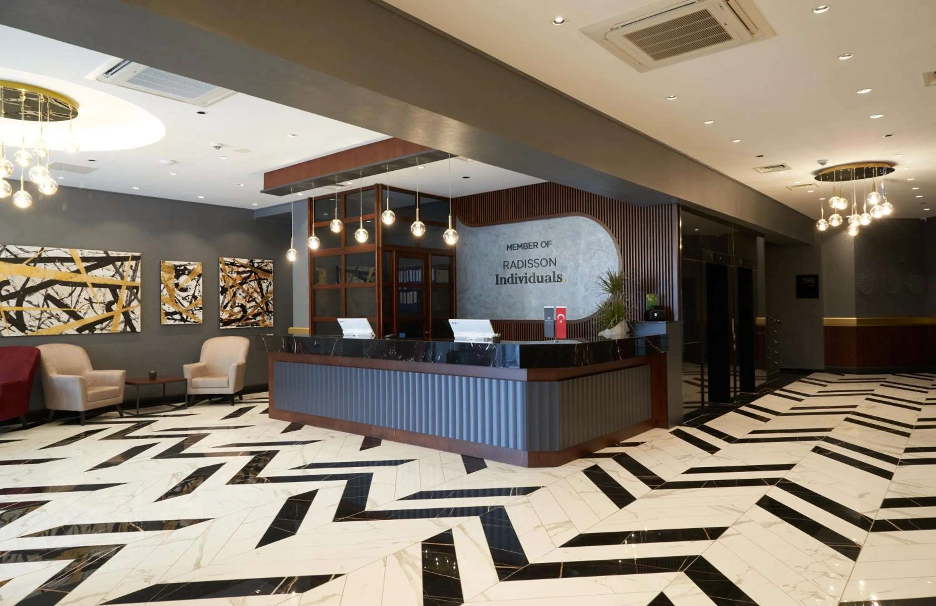 Lobby or reception in Nova Vista Deluxe & Suites a Member of Radisson Individuals