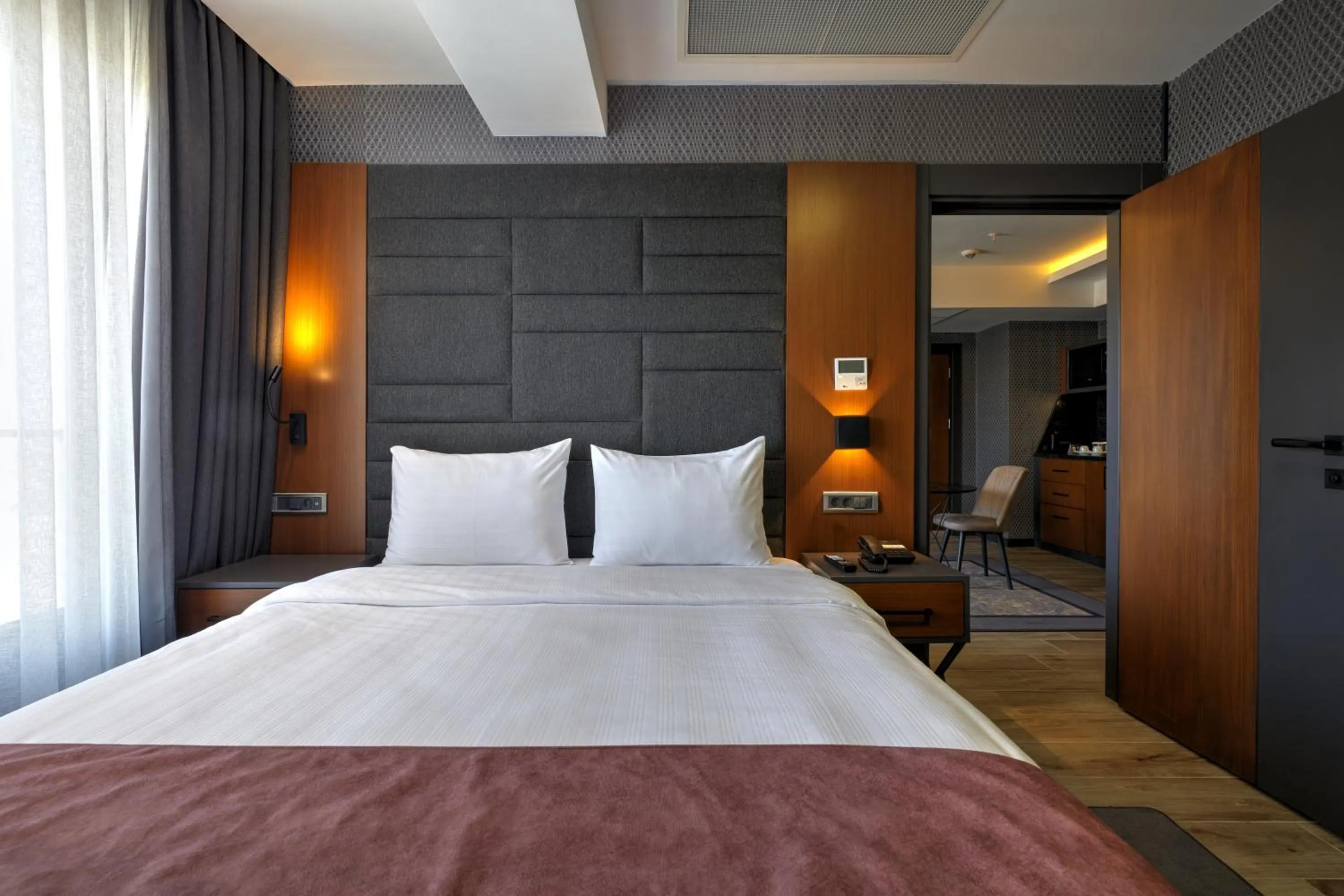 Bed in Nova Vista Deluxe & Suites a Member of Radisson Individuals